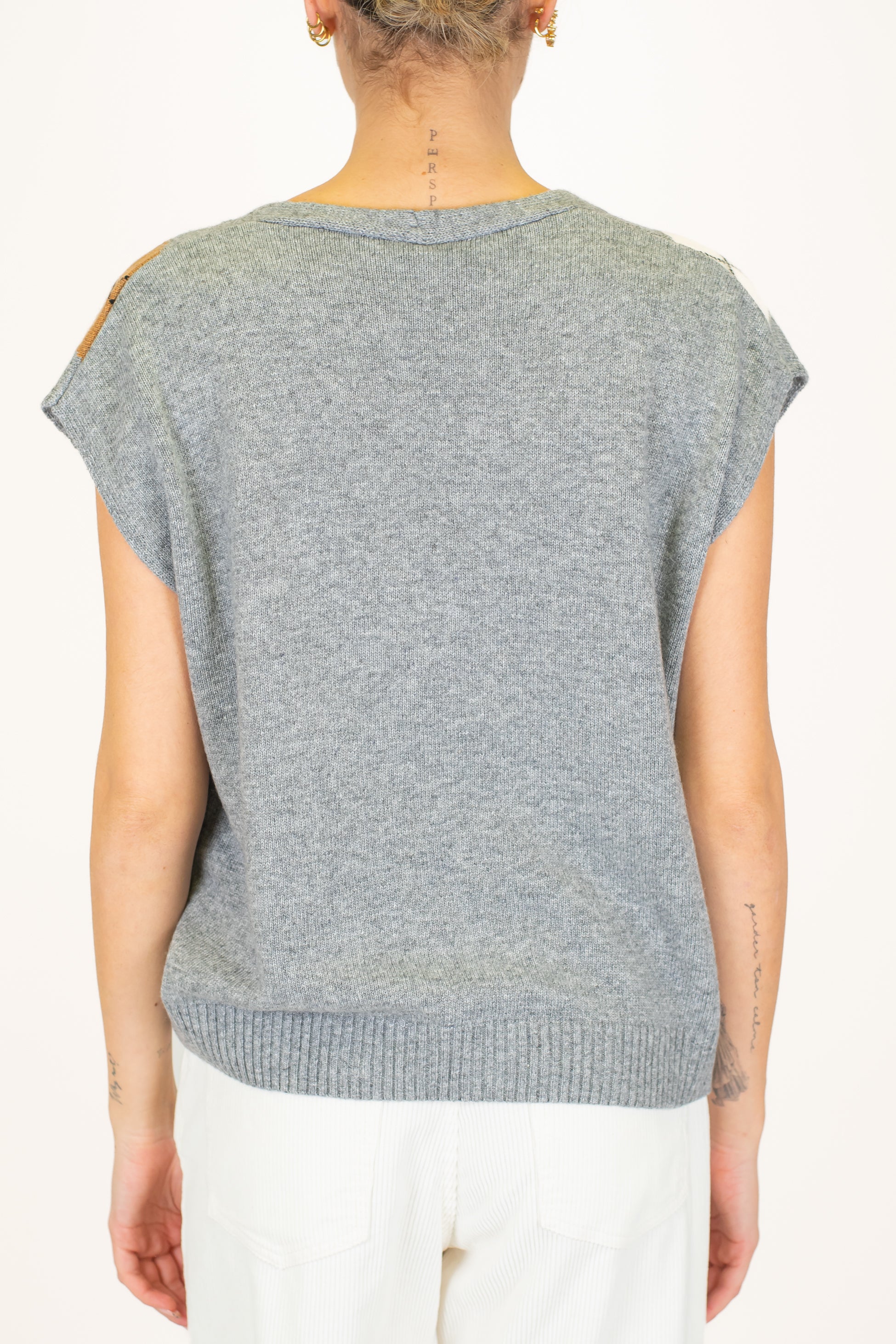 Tensione in - Gilet in maglia fantasia rombi a contrasto