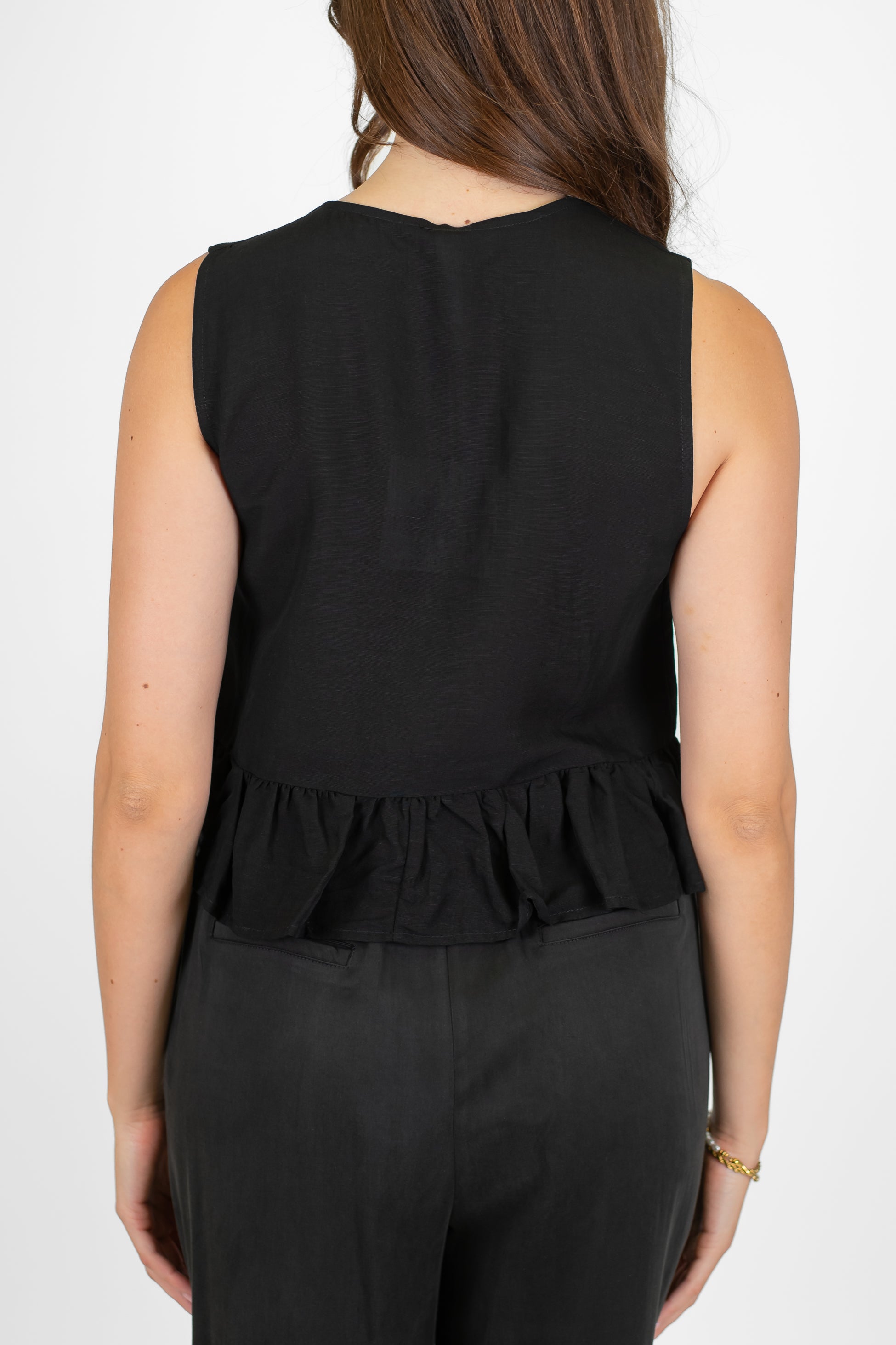 Tensione in - Gilet in misto lino e viscosa con chiusura laccetti e balza sul fondo