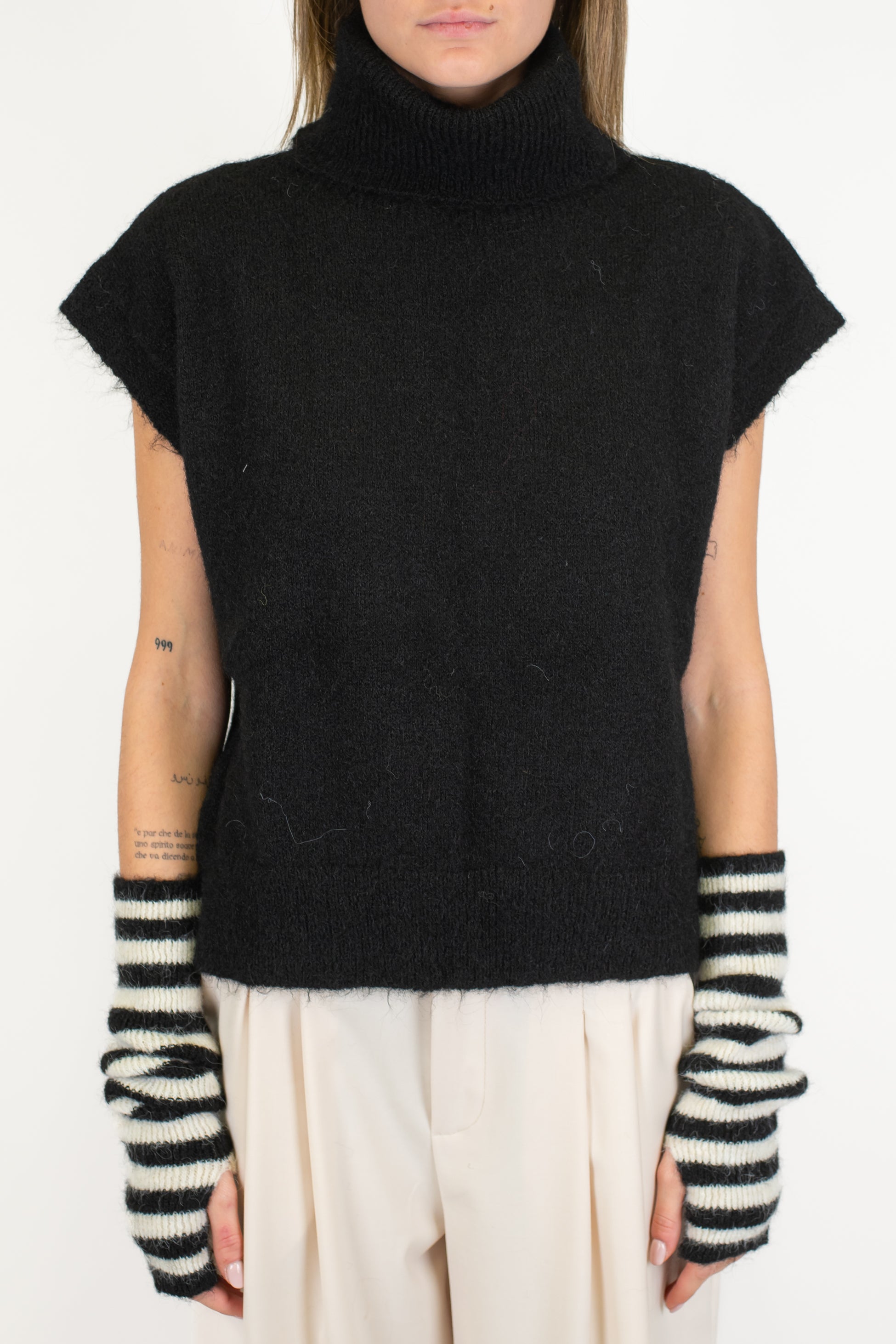 Tensione in - Dolcevita giromaniche in misto lana con manicotti fantasia a righe