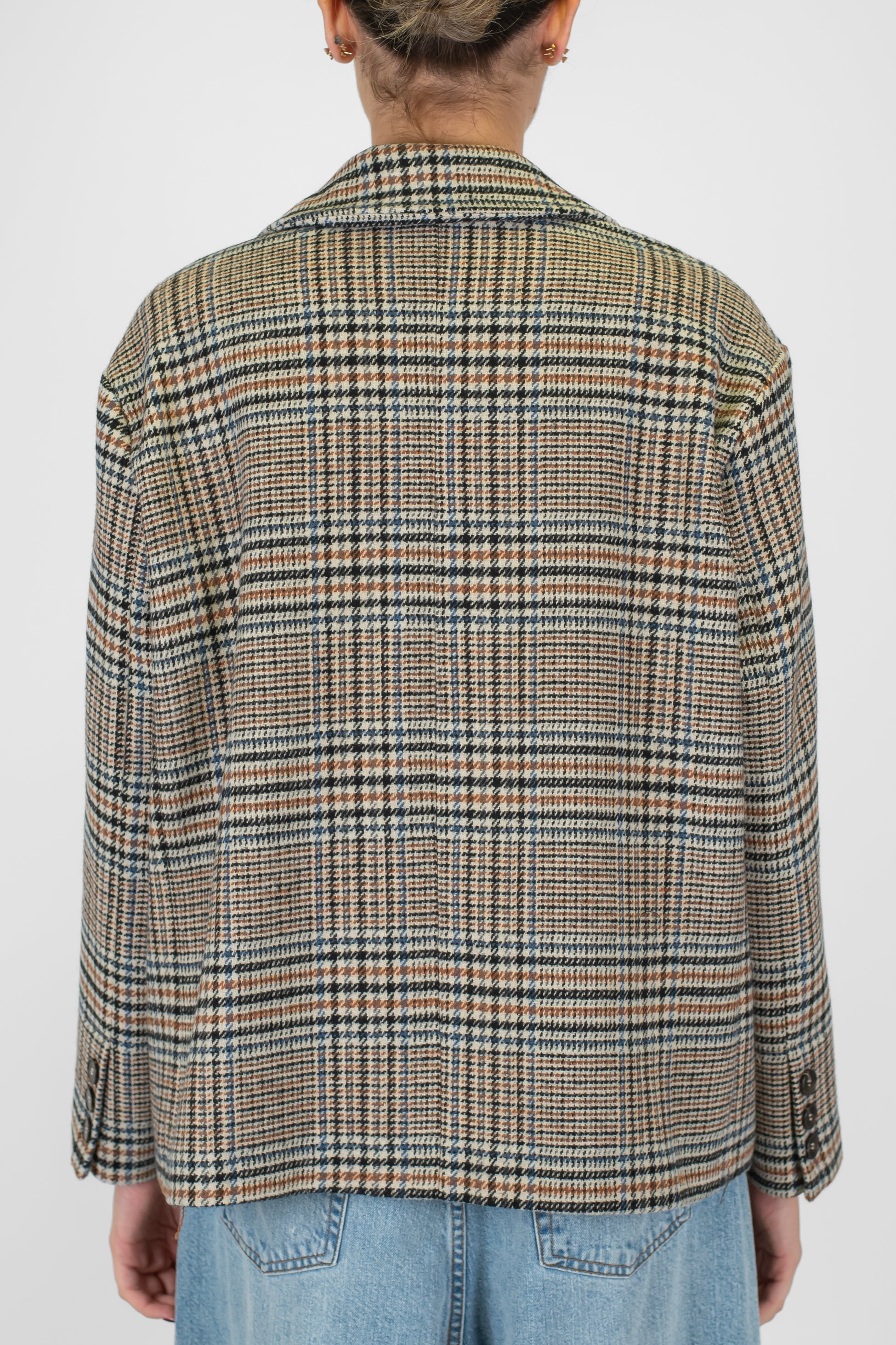 Tensione in - Giacca doppiopetto principe di galles con spille sul rever