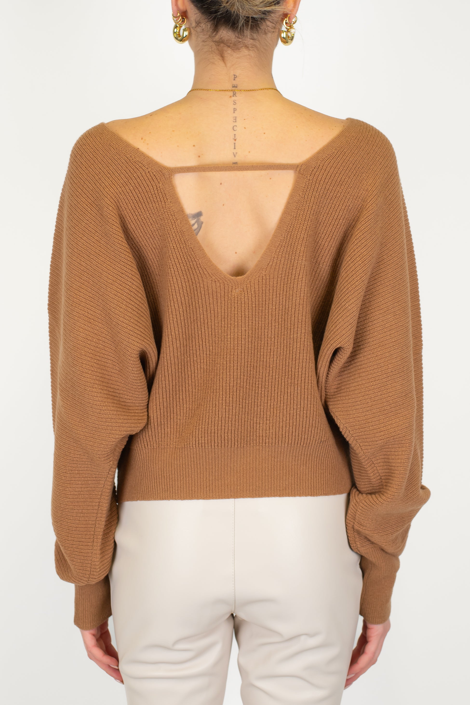 Tensione in - Maglia scollo a V fronte-retro in pura lana