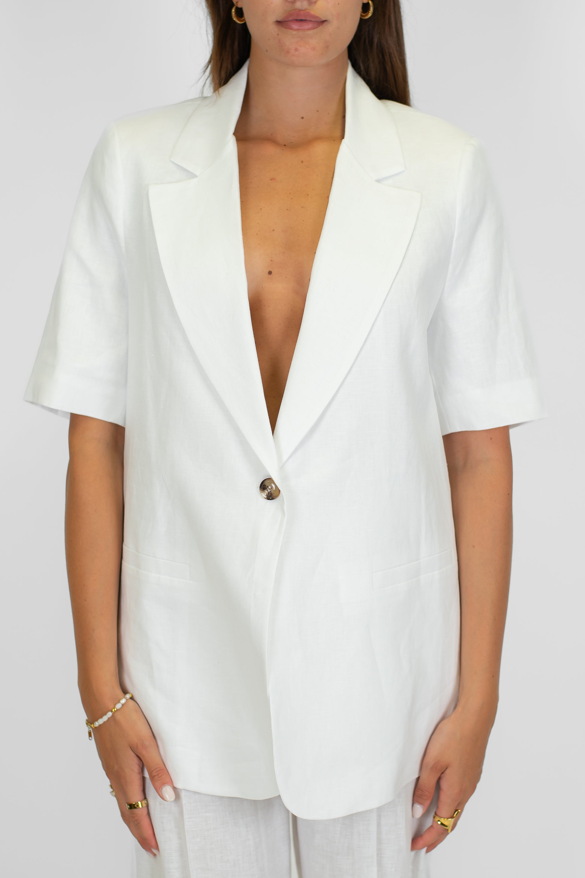 Tensione in - Giacca monopetto mezza manica in 100% lino