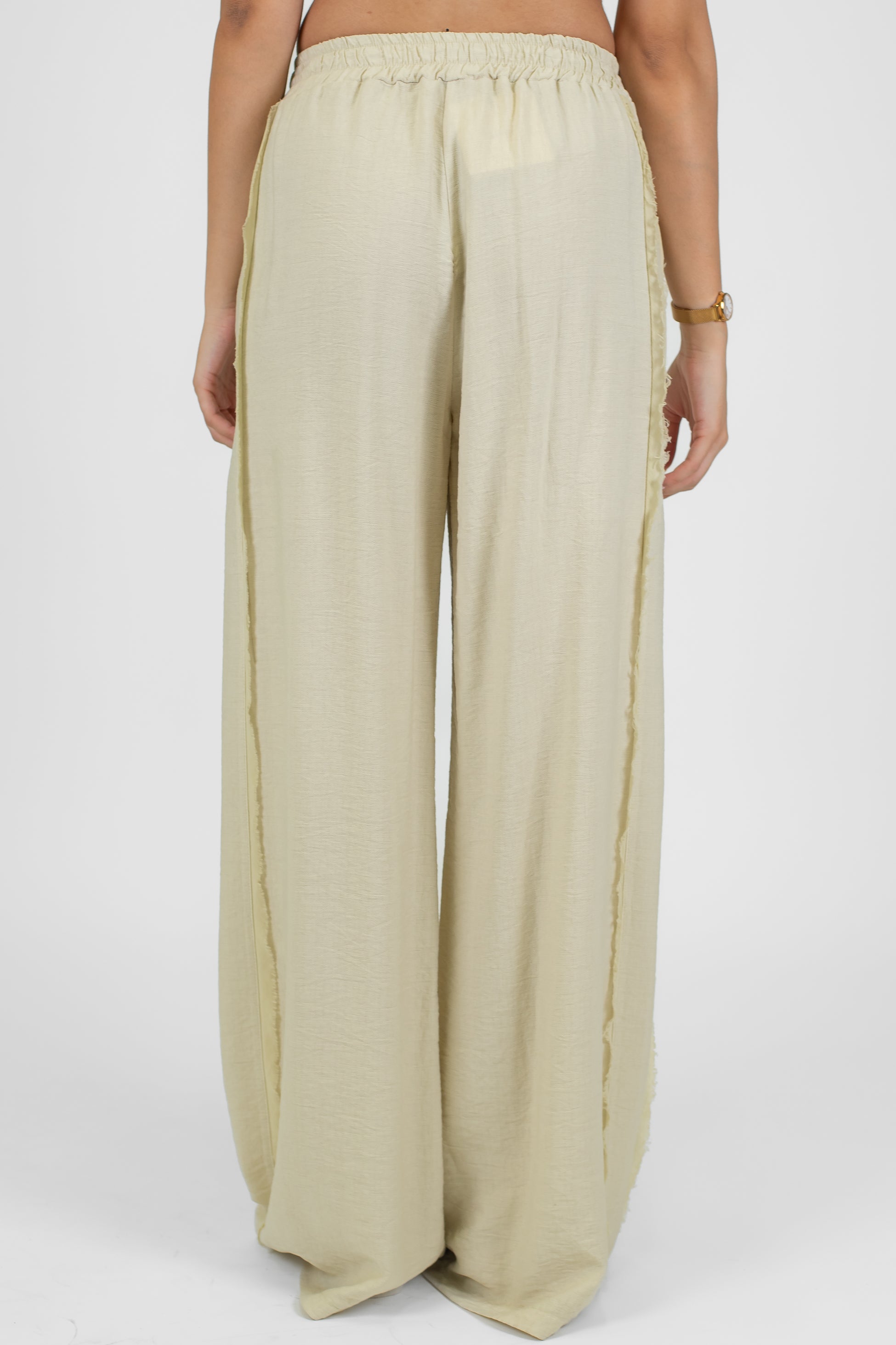 Tensione in - Pantalone palazzo in viscosa leggera con banda laterale sfrangiata ed elastico in vita