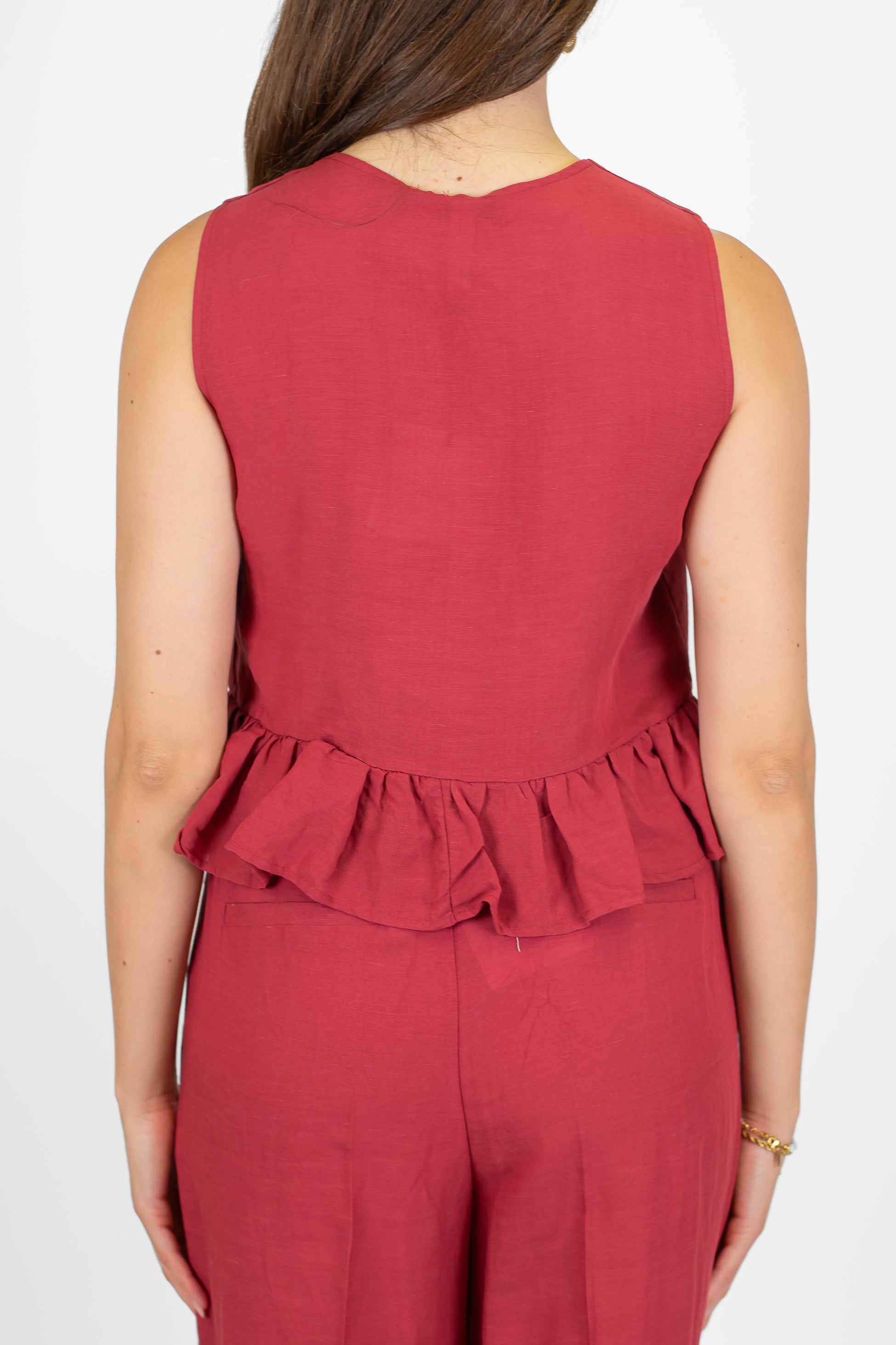 Tensione in - Gilet in misto lino e viscosa con chiusura laccetti e balza sul fondo