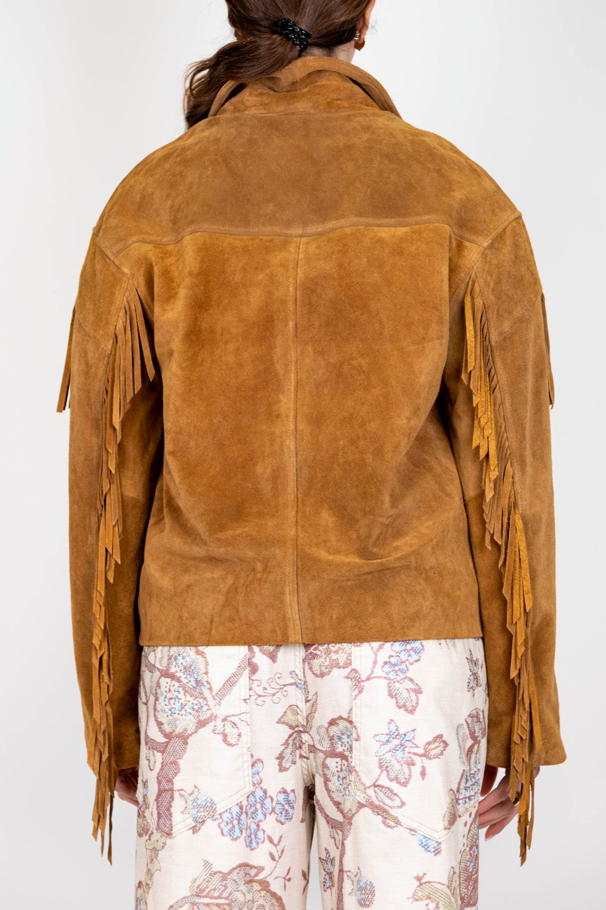 Tensione in - Giacca in camoscio con frange su fronte e maniche