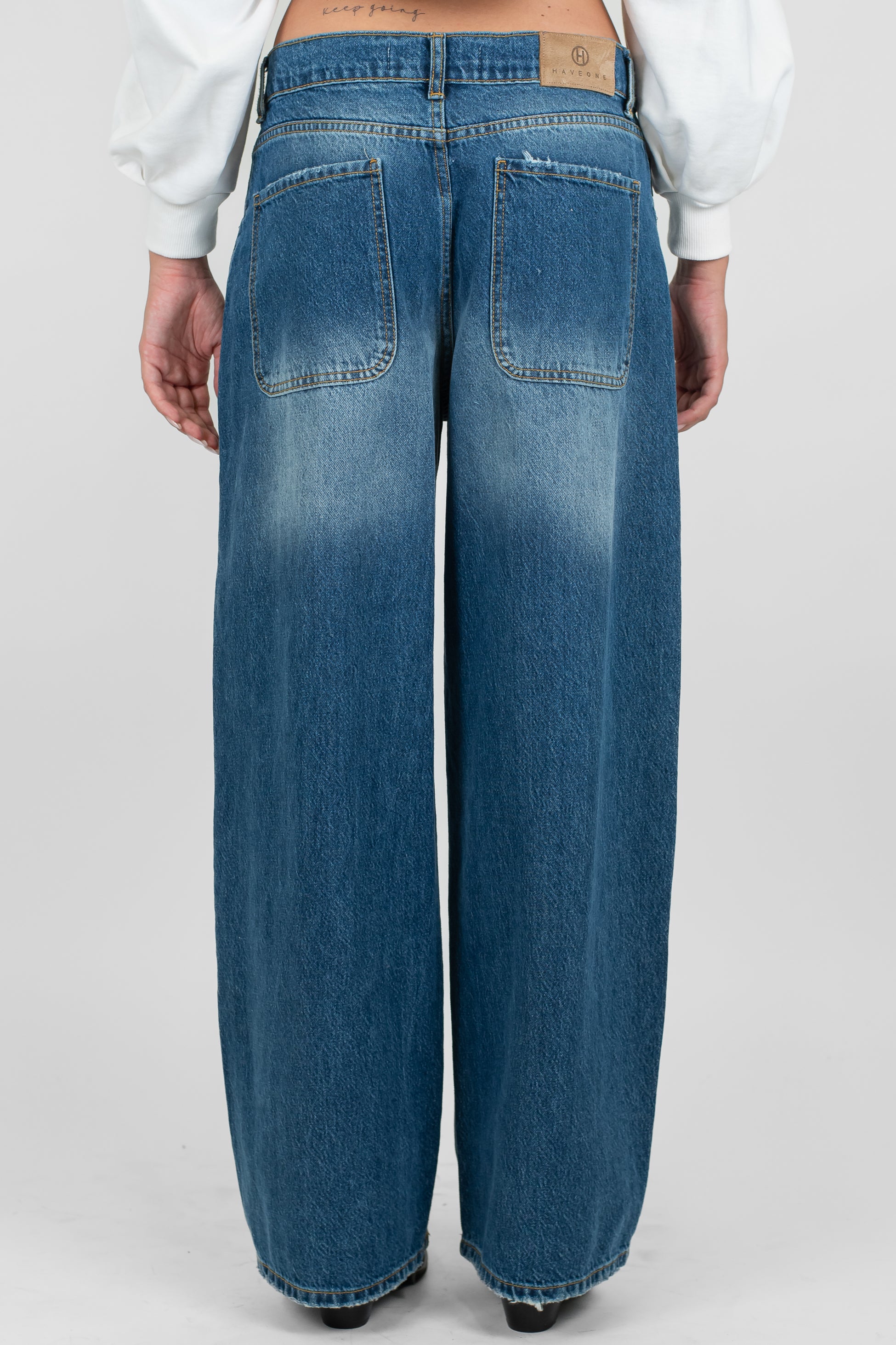 Haveone - Jeans palazzo lavaggio medio modello Bella con rotture sulle ginocchia