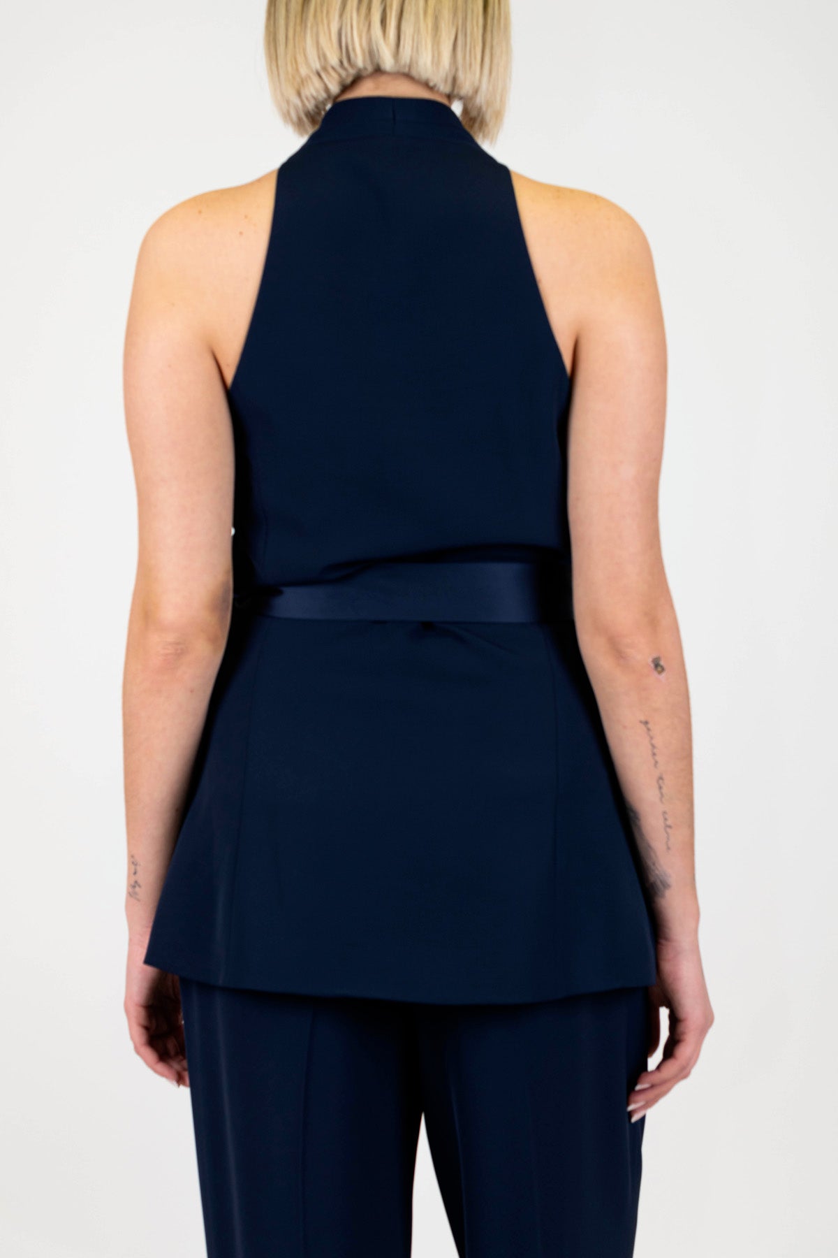 Imperial - Maxi gilet a portafoglio in tessuto fluido con fiocco e dettagli in raso