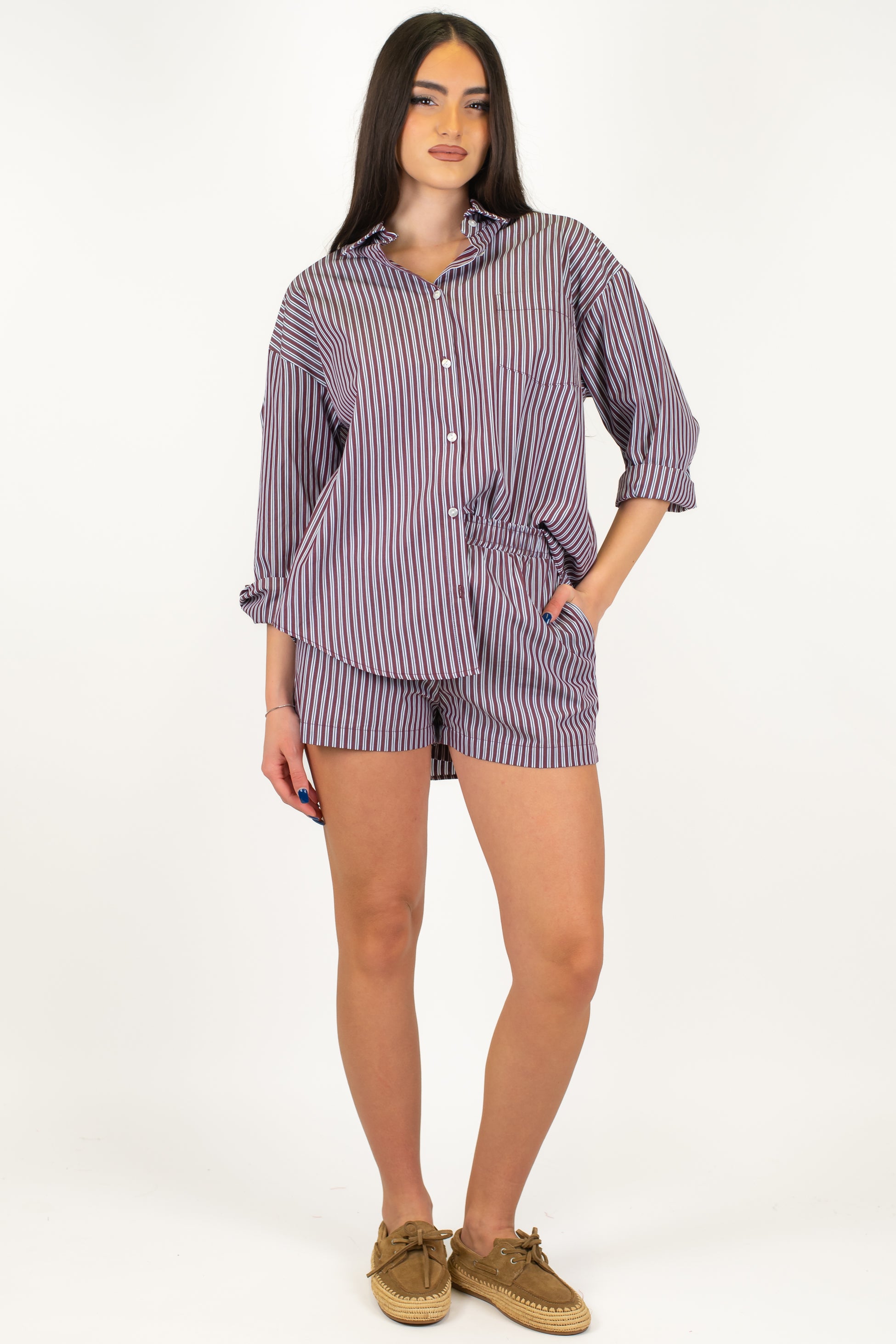 Tensione in - Shorts fantasia a righe con elastico in vita e bottoncini