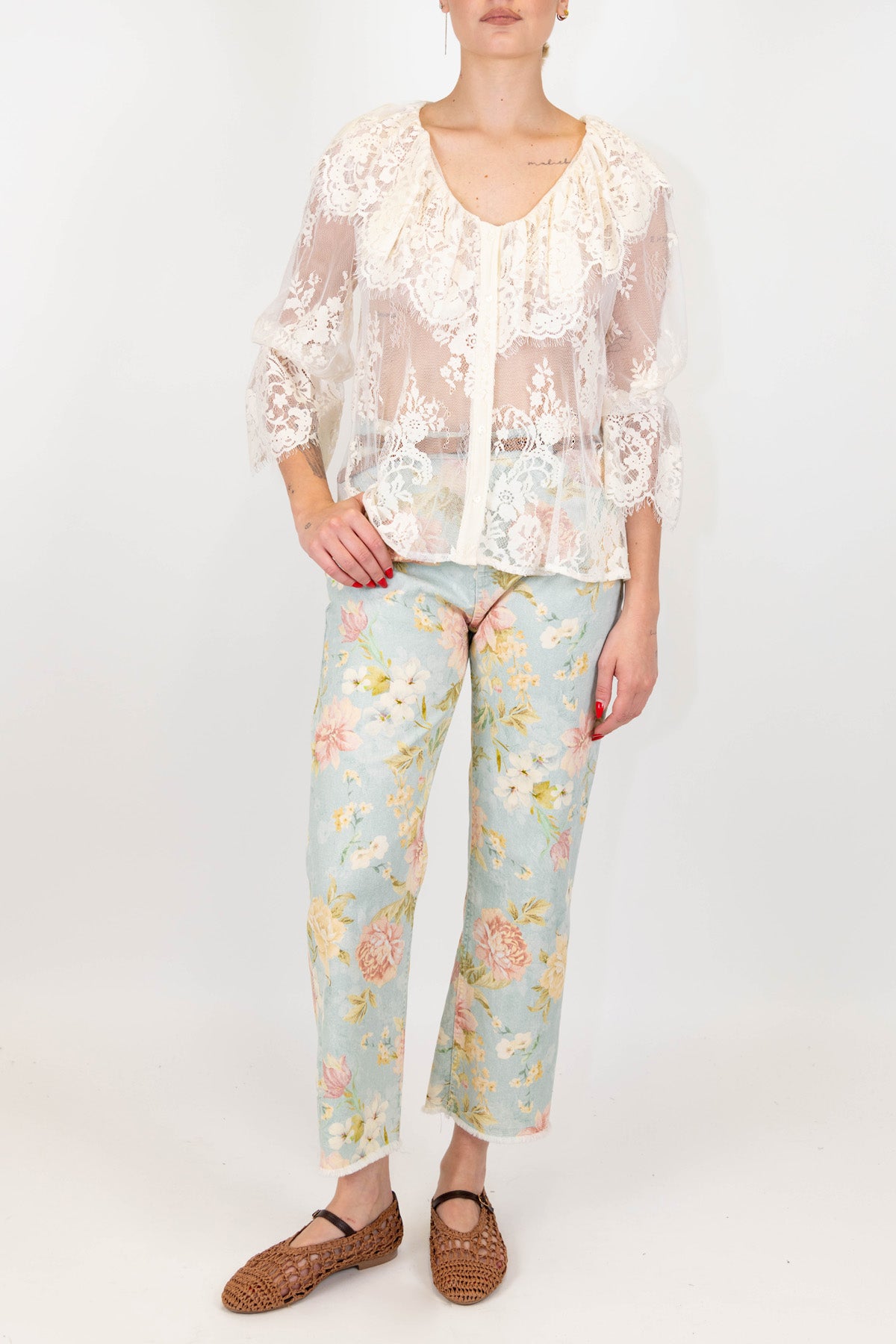 Tensione in - Pantalone fantasia floreale in denim sfrangiato sul fondo