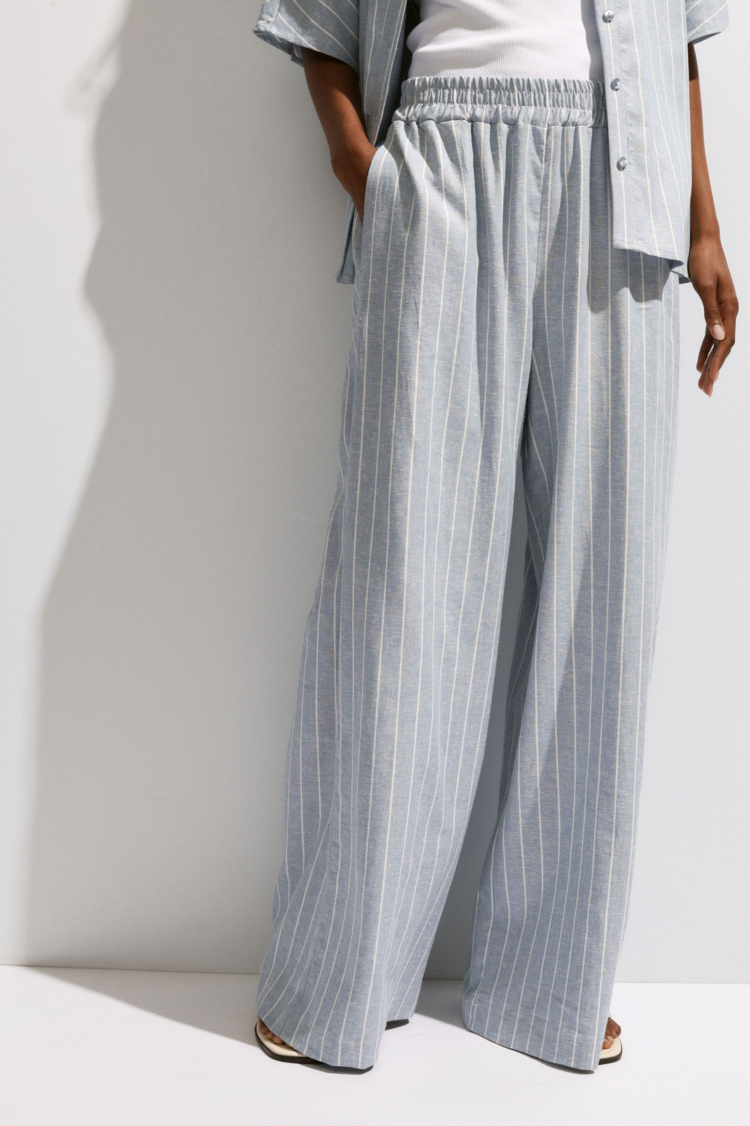 Please - Pantalone palazzo gessato con pinces ed elastico in vita