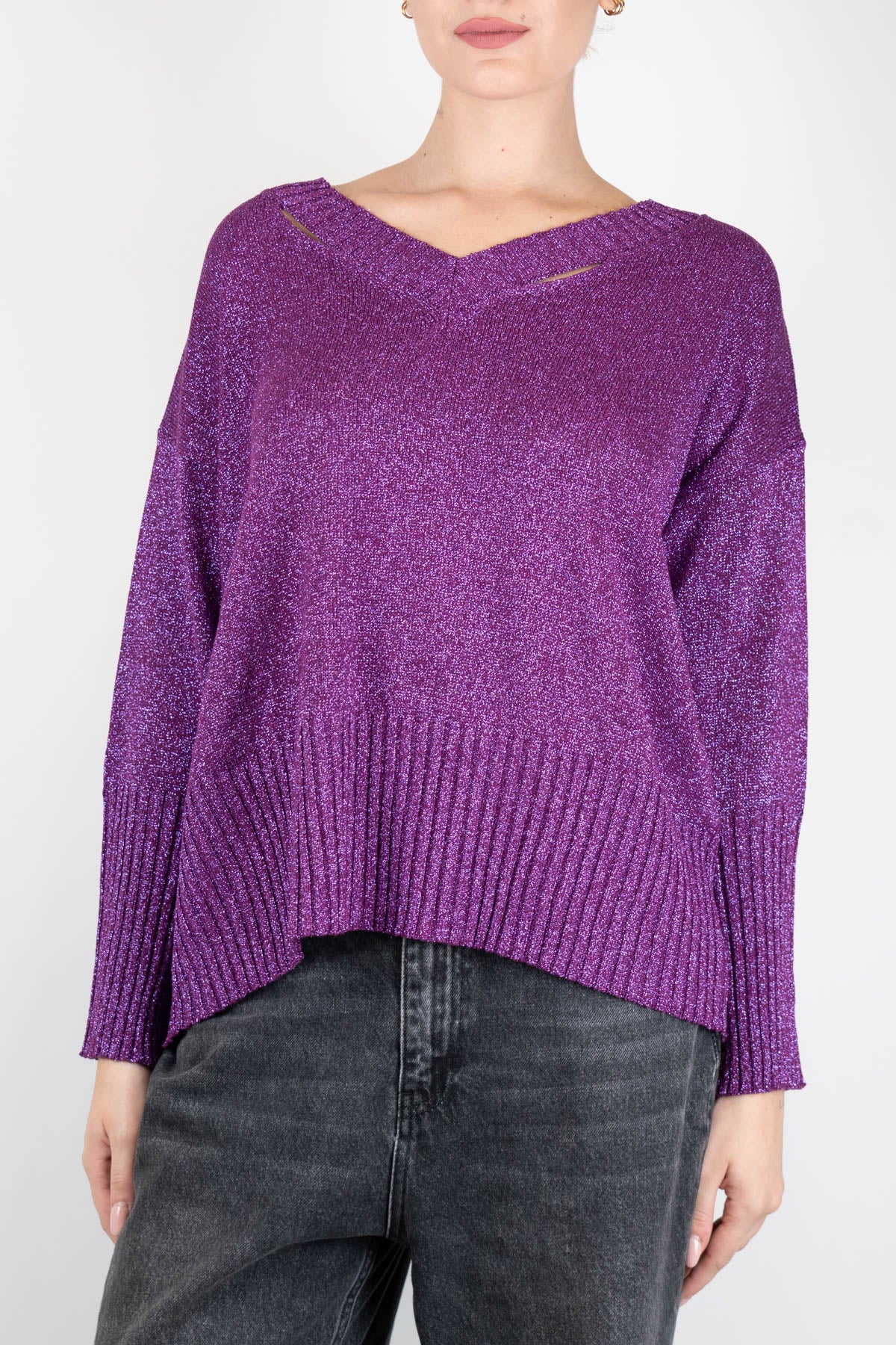 Tensione in Maglia lurex a scatola con aperture lungo lo scollo a V