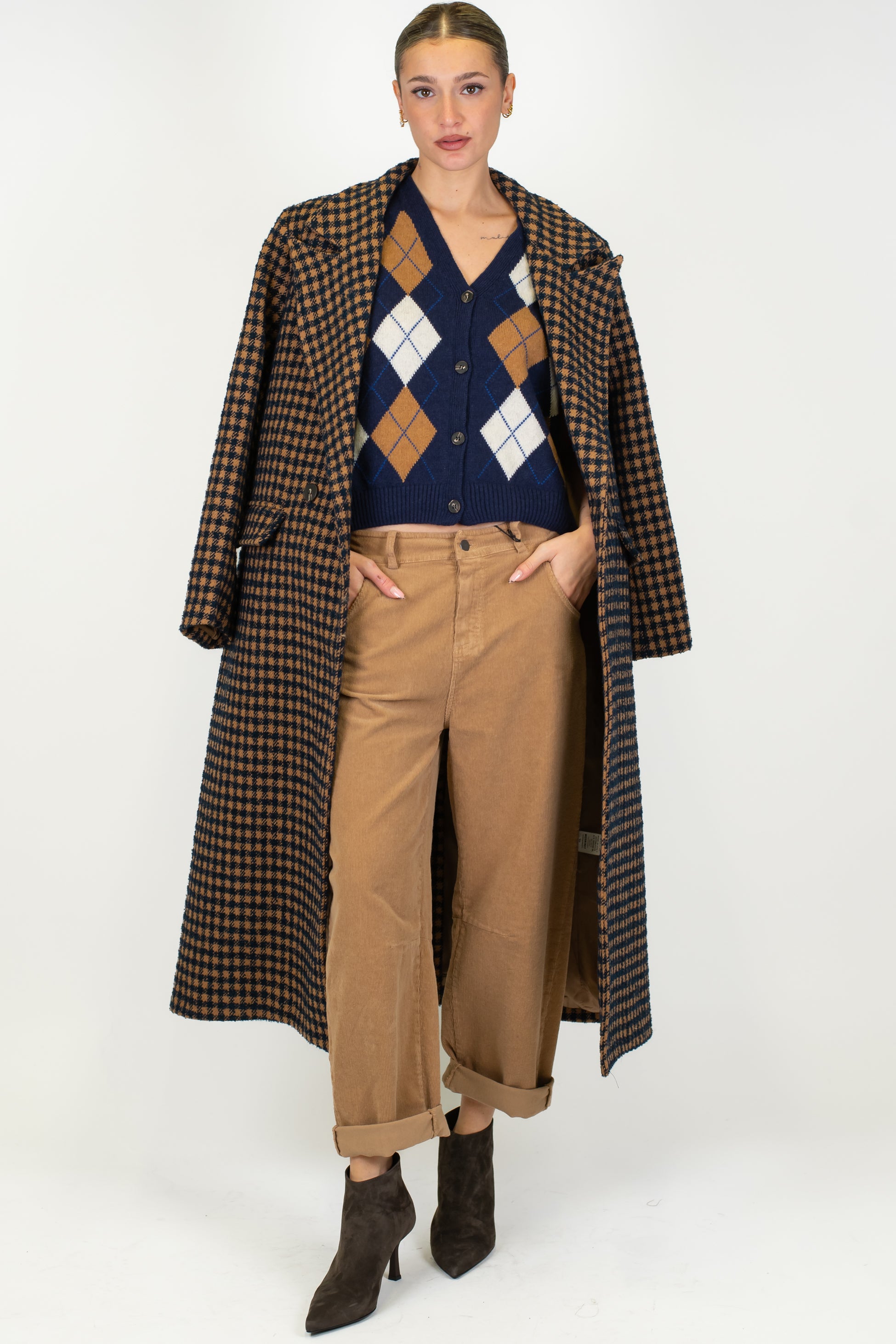 Tensione in - Gilet in maglia fantasia rombi a contrasto