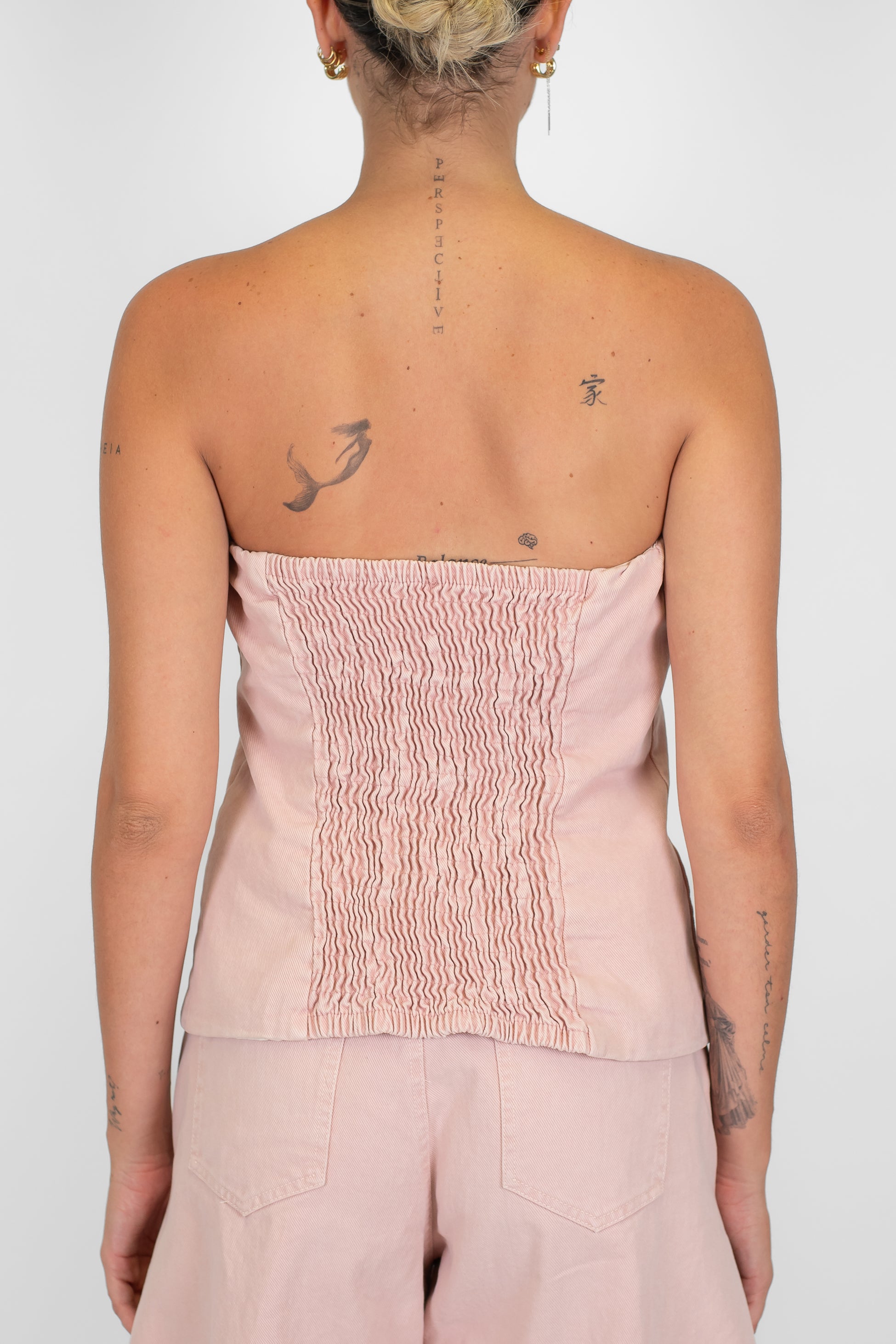 Tensione in - Top a fascia in denim colorato con elastico sul retro