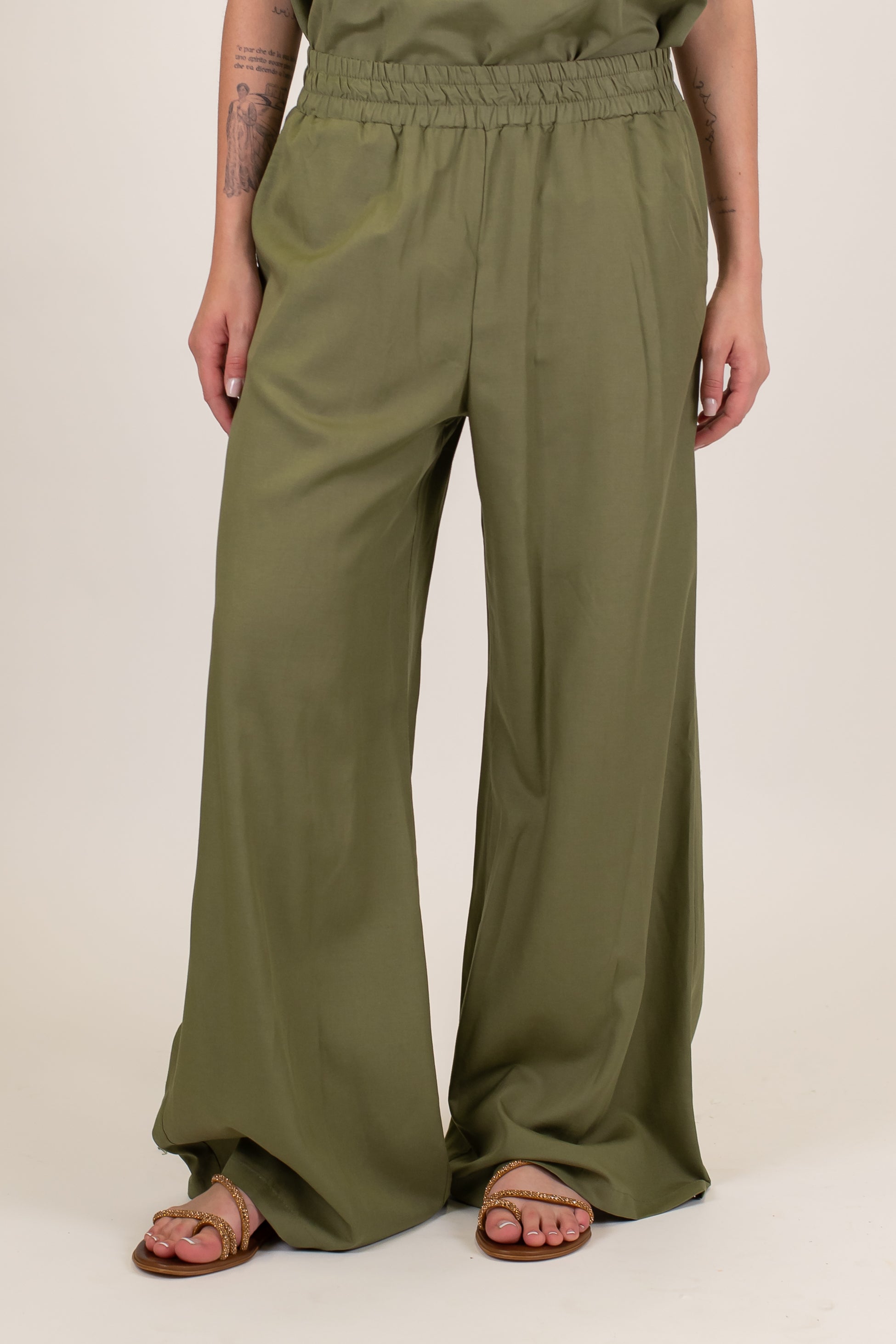 Tensione in - Coordinato in misto lino con top a fascia e pantalone palazzo con elastico sul retro