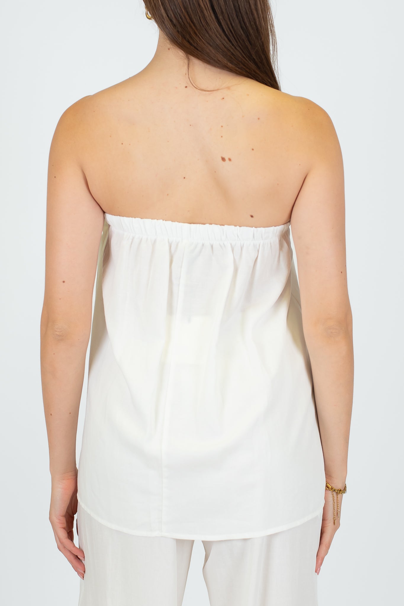 Tensione in - Coordinato in misto lino con top a fascia e pantalone palazzo con elastico sul retro