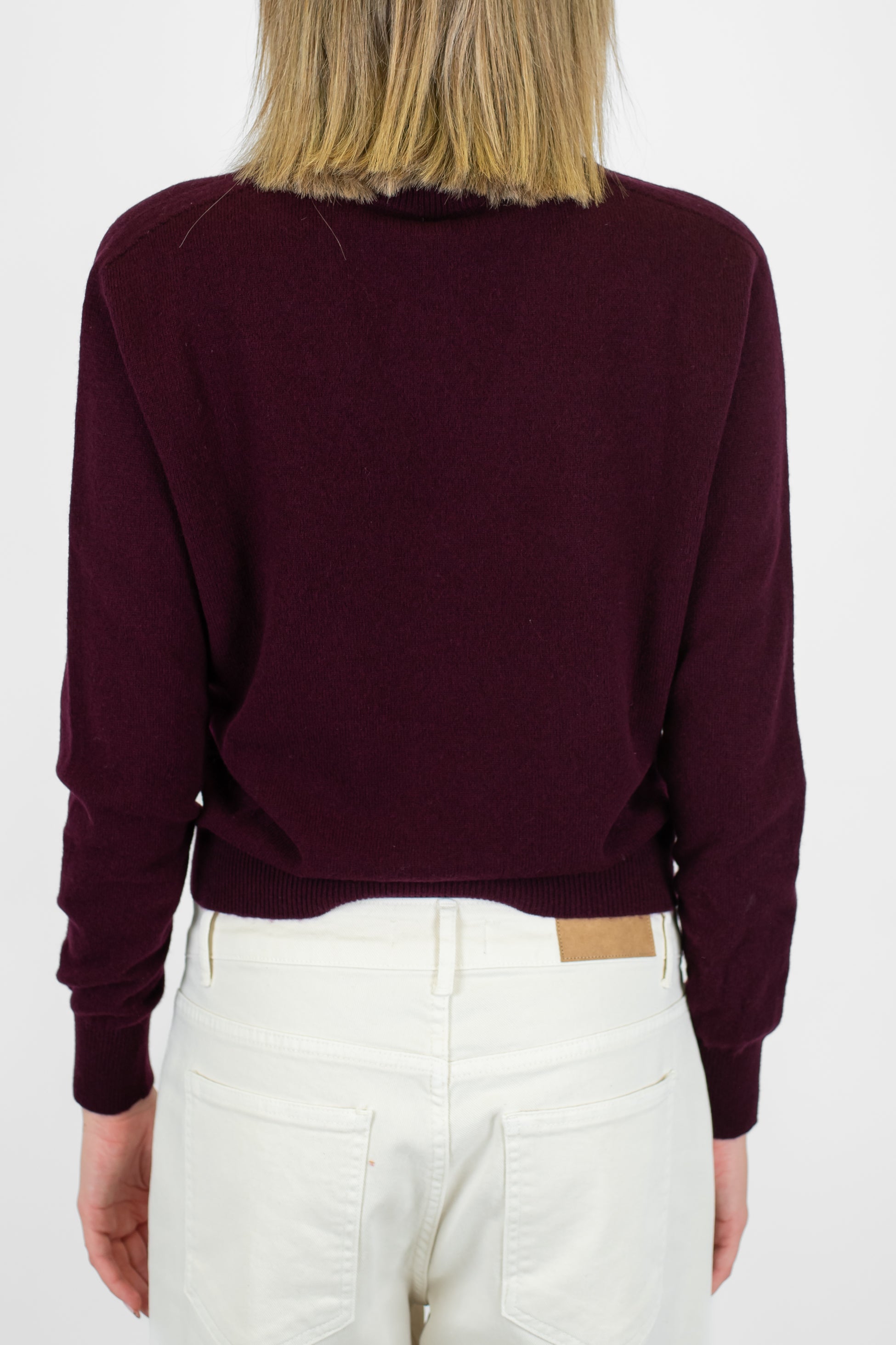 Tensione in - Maglia scollo a V in pura lana