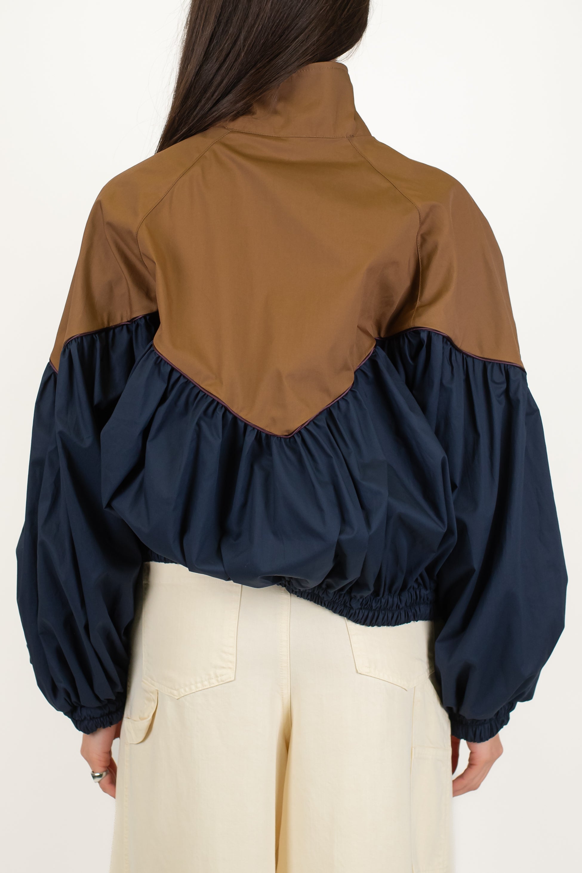 Tensione in - Bomber doppio colore con chiusura zip ed elastico in vita