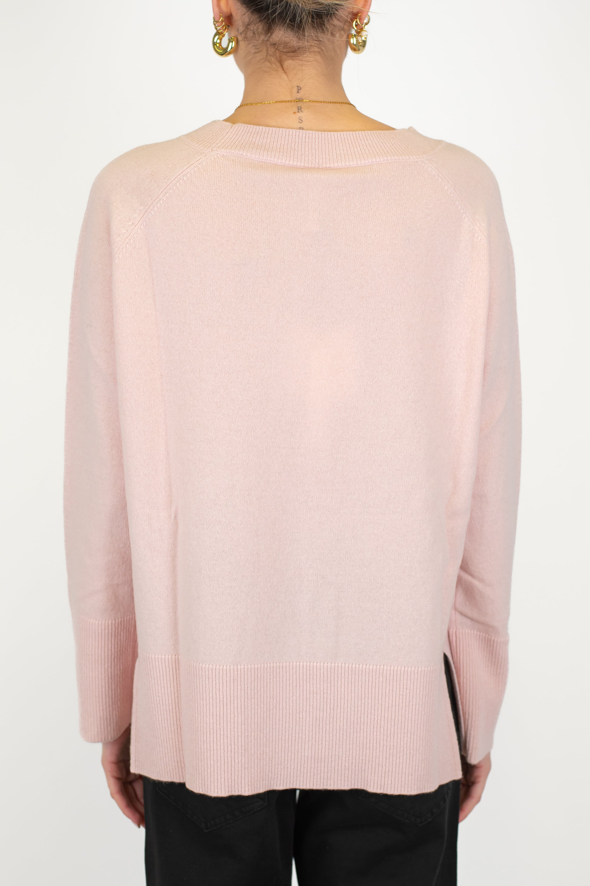 Tensione in - Maglia over in pura lana con spacchetti laterali