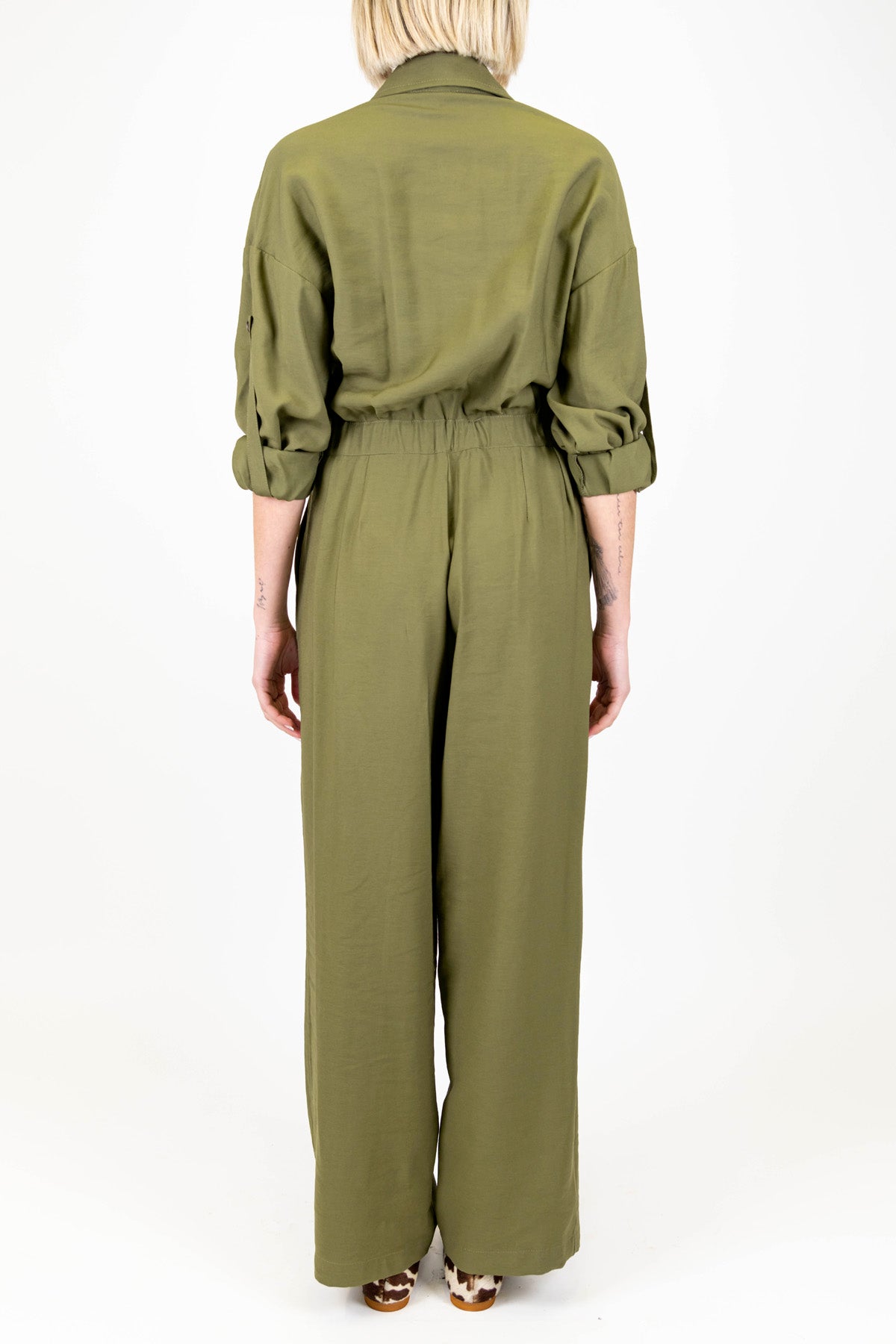 Tensione in - Tuta in viscosa con borchie