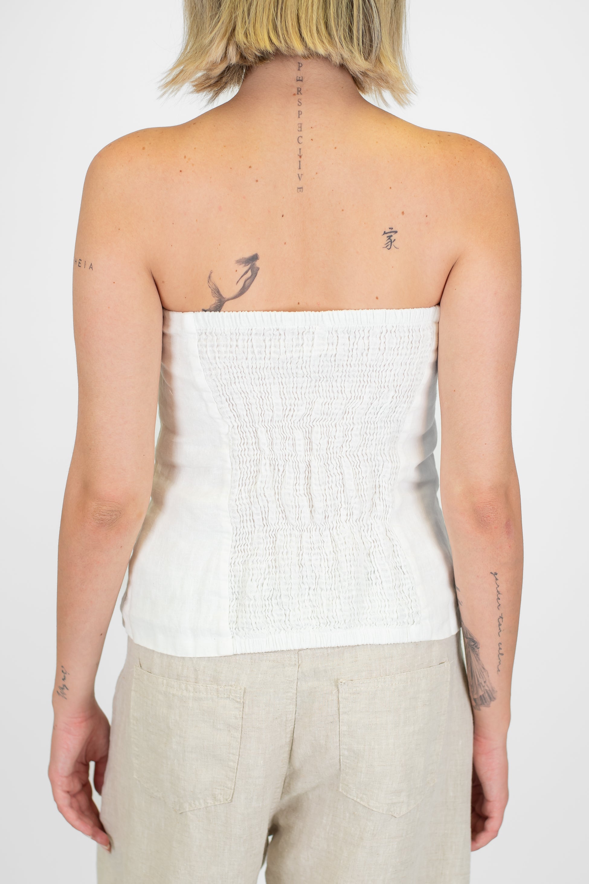 Tensione in - Top a fascia in puro lino