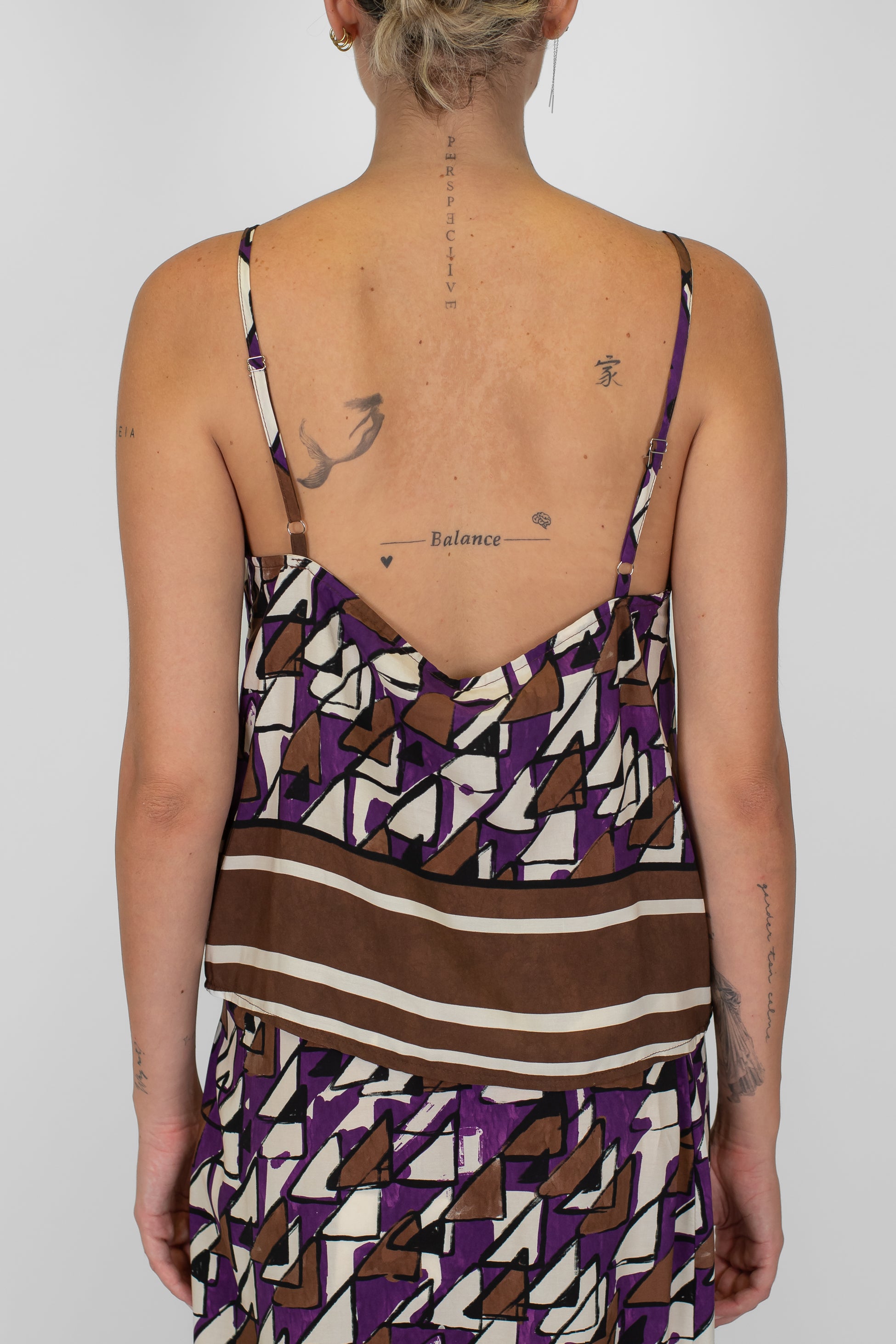 Tensione in- Top con bretelline fantasia a righe in viscosa