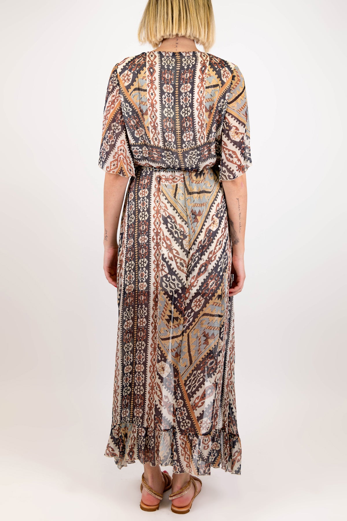 Tensione in - Abito lungo fantasia etnica in viscosa con scollo a V e asimmetria fronte-retro