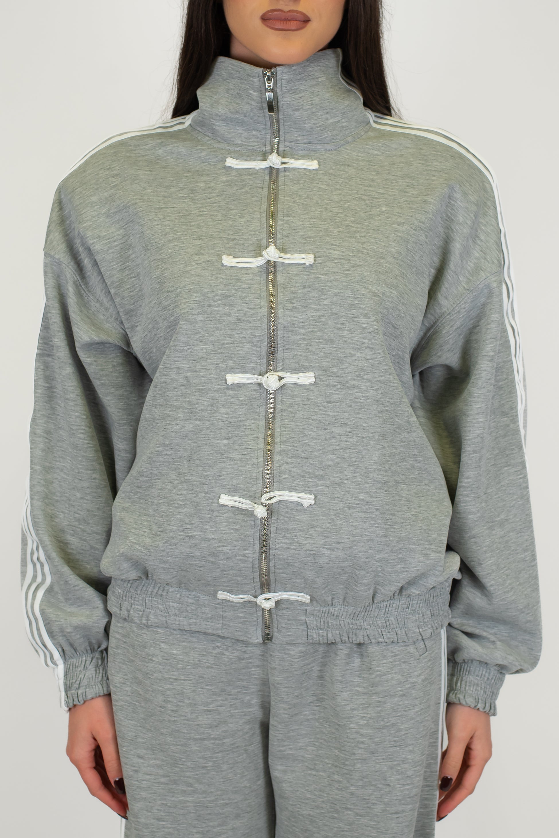 Tensione in - Felpa con alamari e chiusura zip