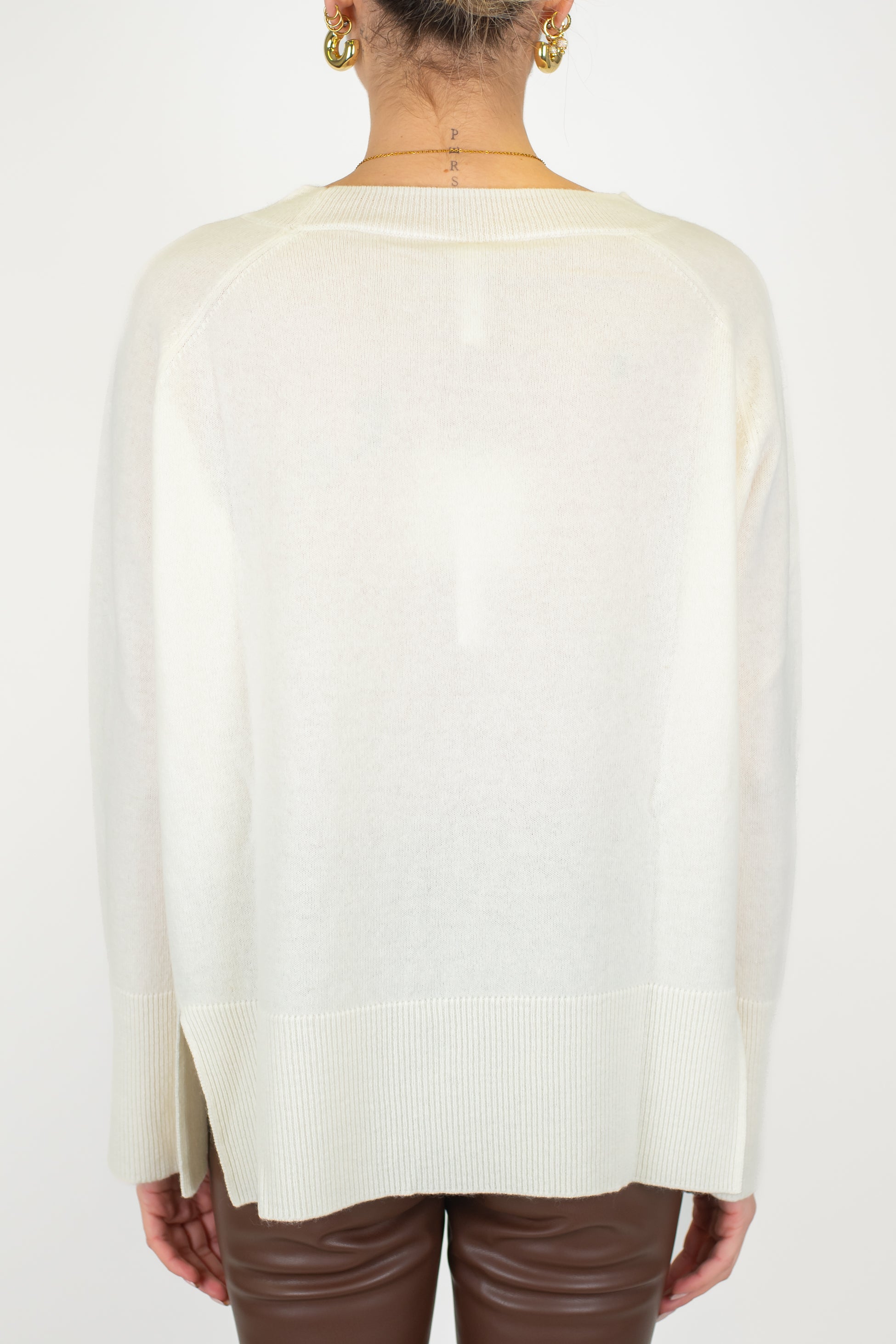 Tensione in - Maglia over in pura lana con spacchetti laterali