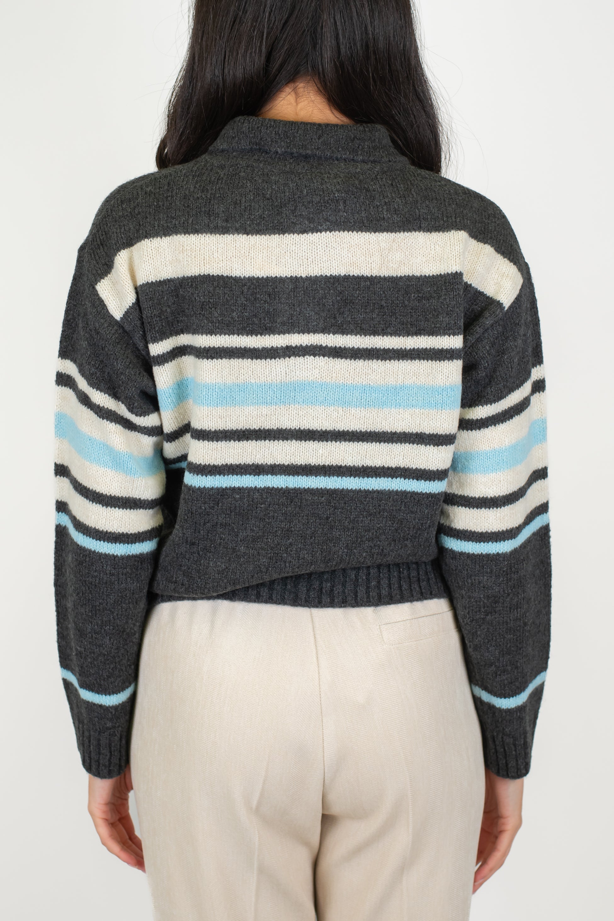 Tensione in - Polo in maglia fantasia rigata a contrasto in misto lana