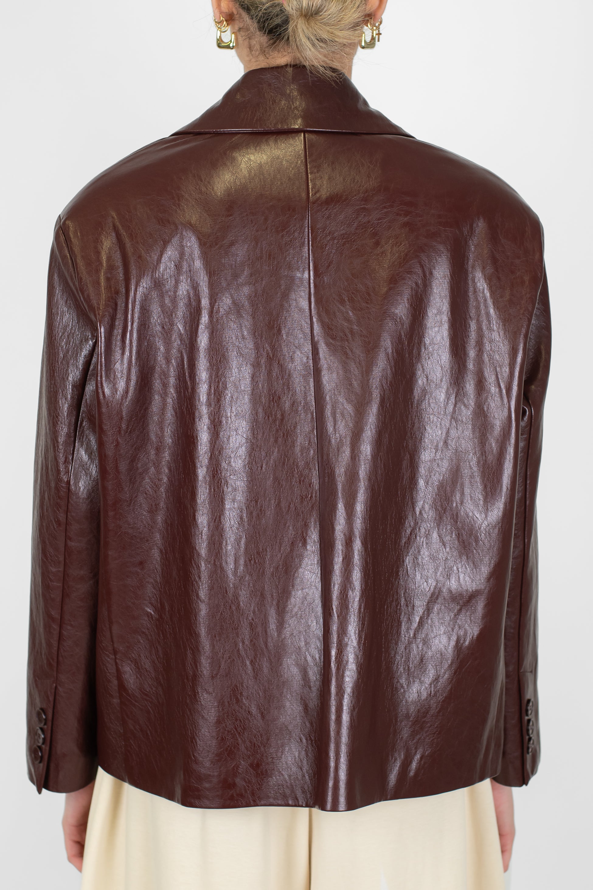 Tensione in - Giacca doppiopetto in ecopelle