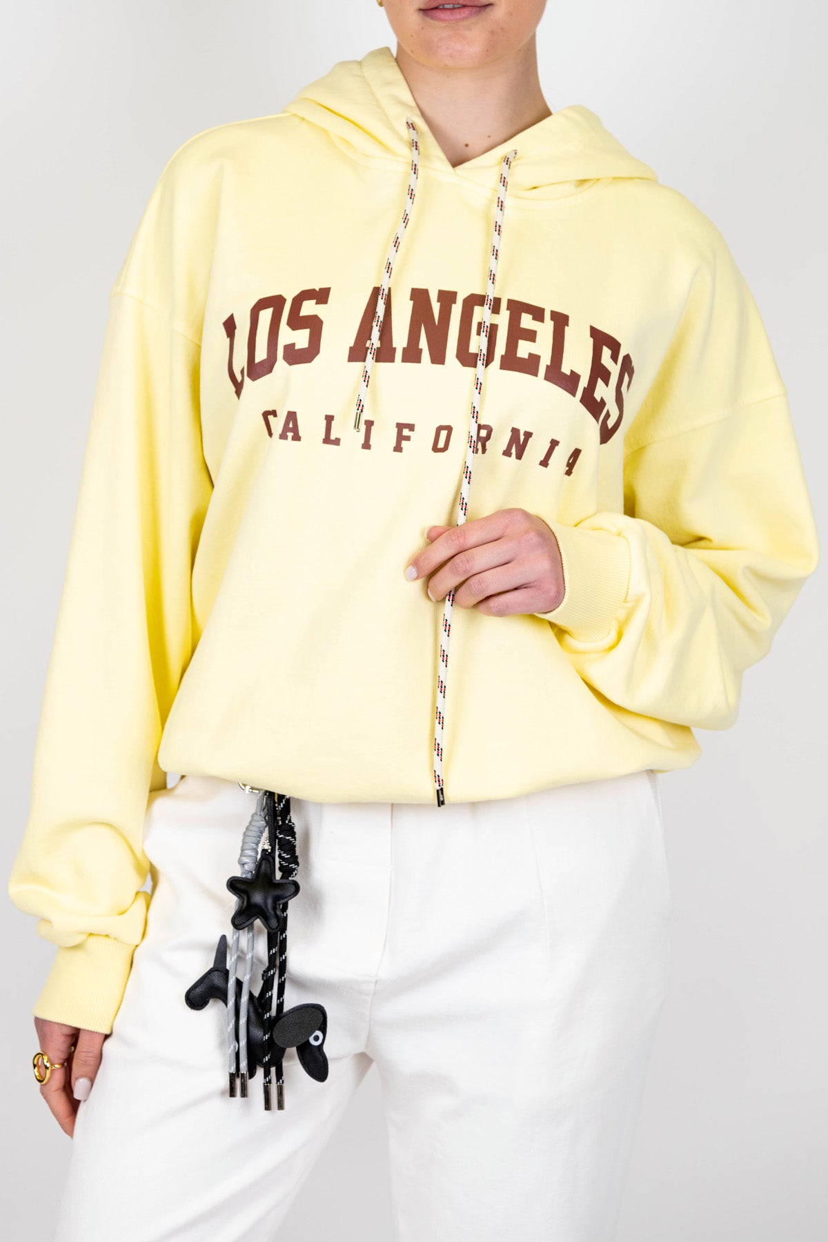 Tensione in - Felpa in cotone con cappuccio e scritta