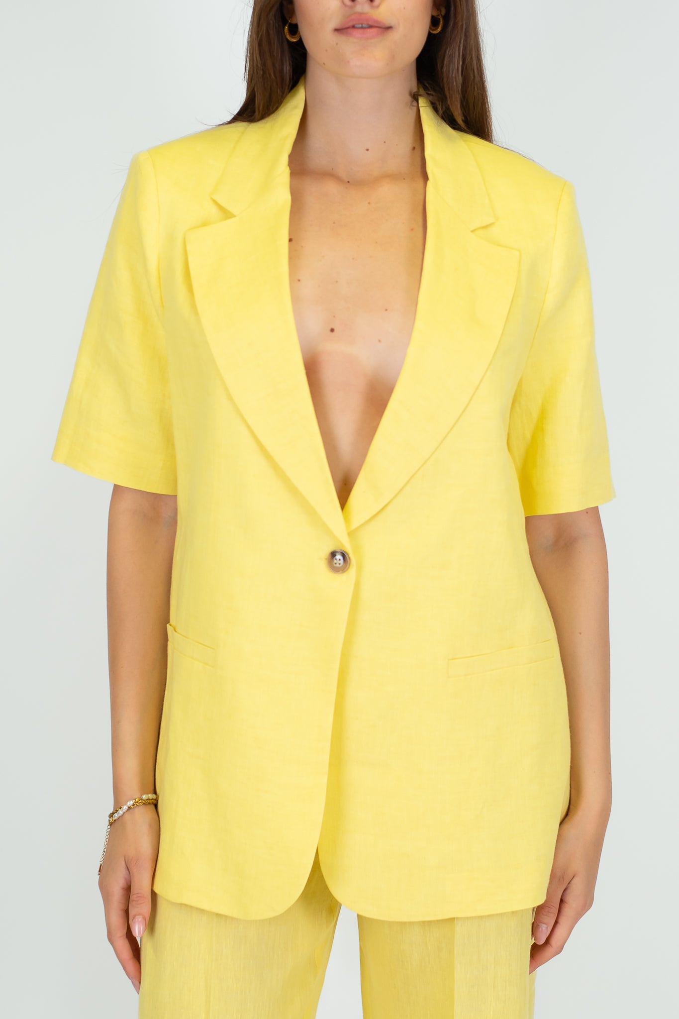 Tensione in - Giacca monopetto mezza manica in 100% lino