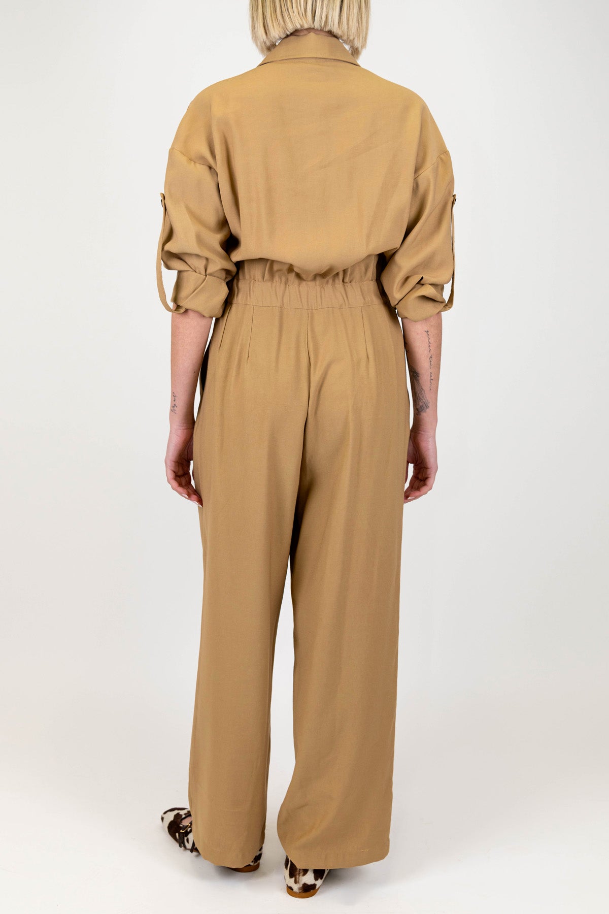 Tensione in - Tuta in viscosa con borchie