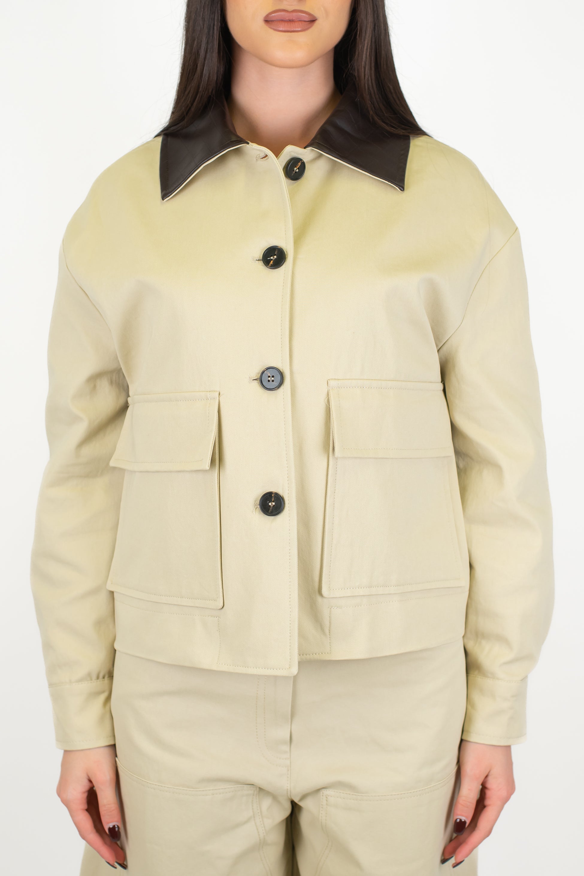 Tensione in - Giubbino in denim colorato con colletto in ecopelle