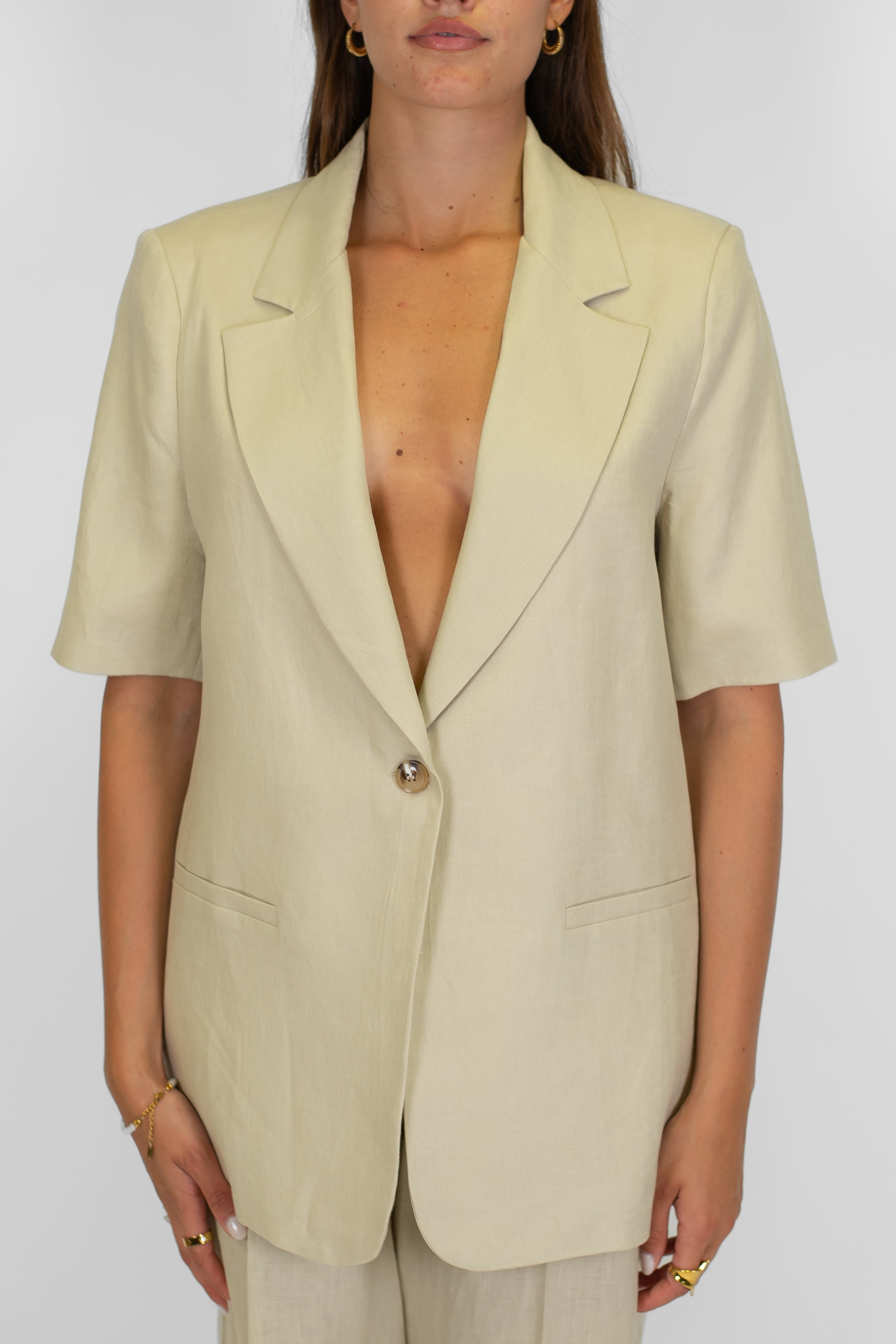 Tensione in - Giacca monopetto mezza manica in 100% lino