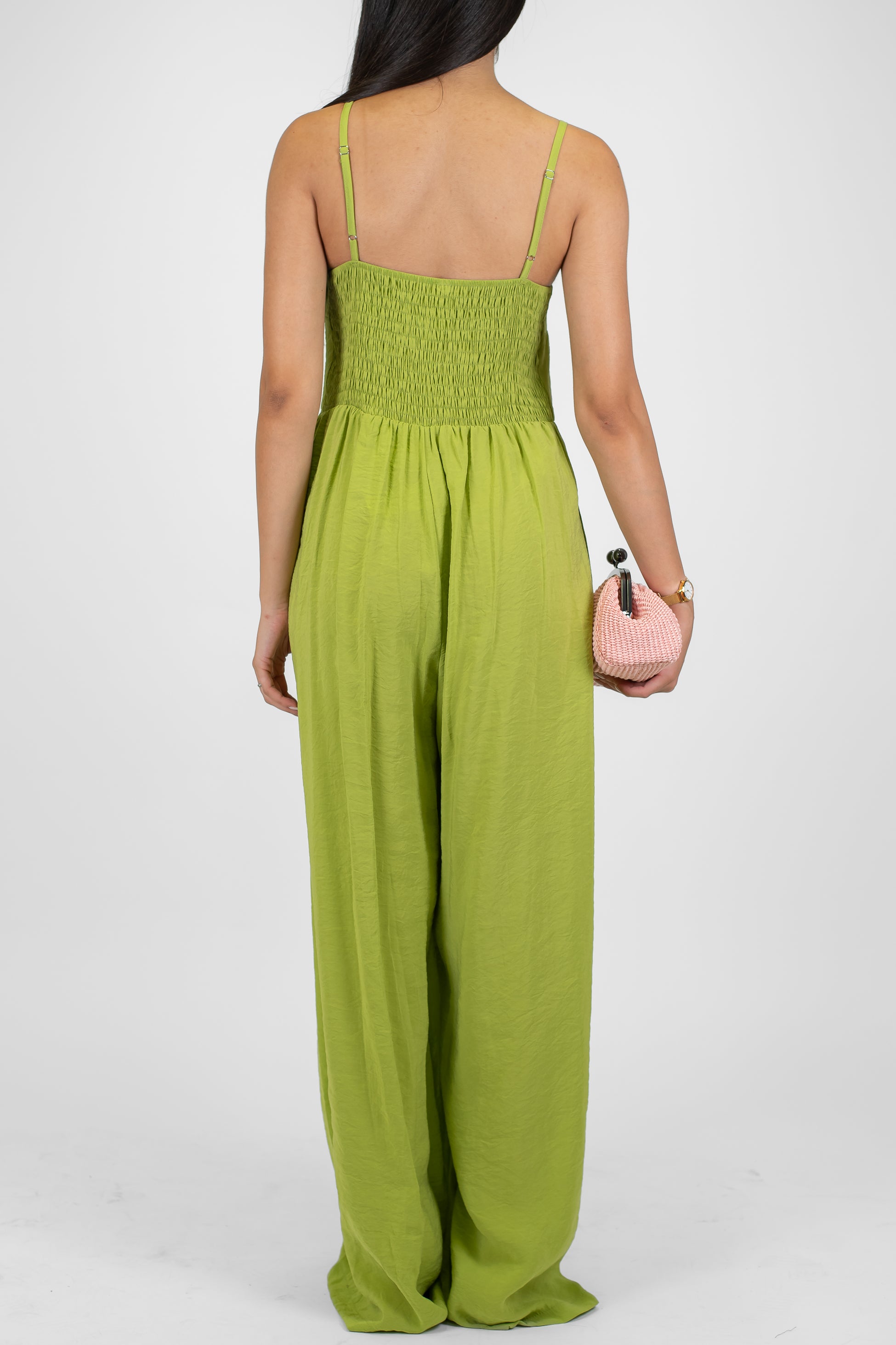 Tensione in - Tuta in modal con bretelline e spilla fiore