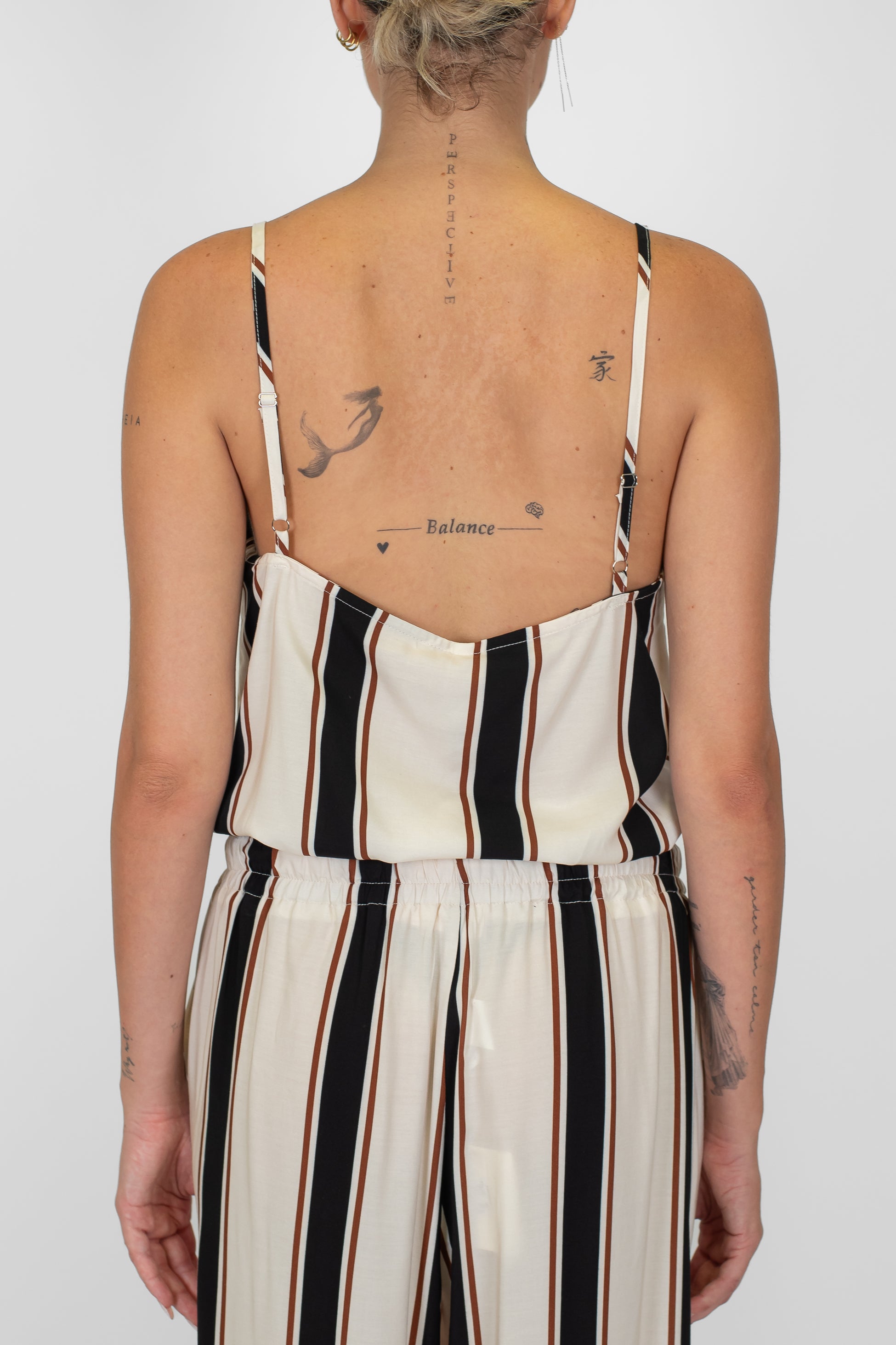 Tensione in- Top con bretelline fantasia astratta in viscosa