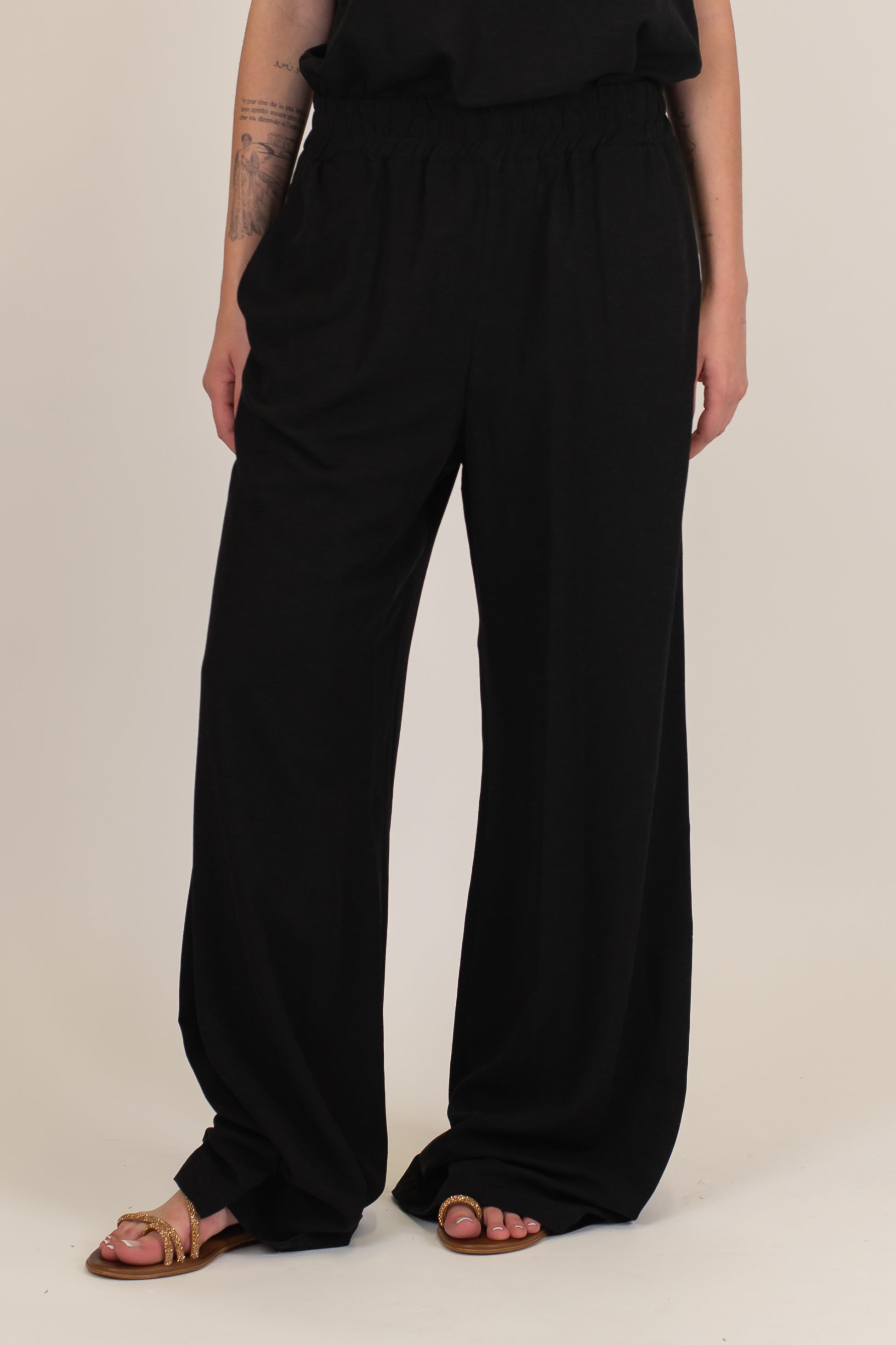 Tensione in - Coordinato in misto lino con top a fascia e pantalone palazzo con elastico sul retro