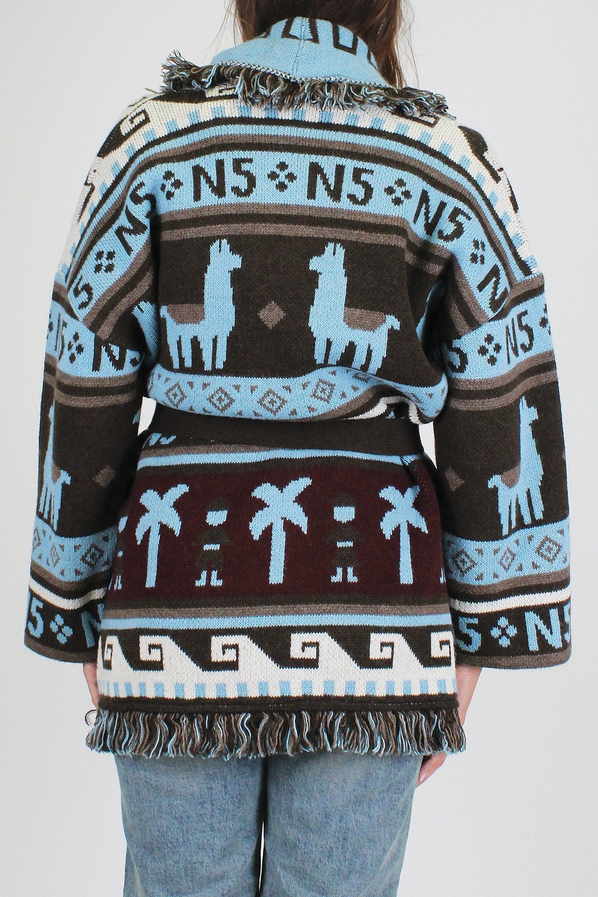 Tensione in - Cardigan fantasia cammelli in misto lana con profilo frange e cintura in tessuto