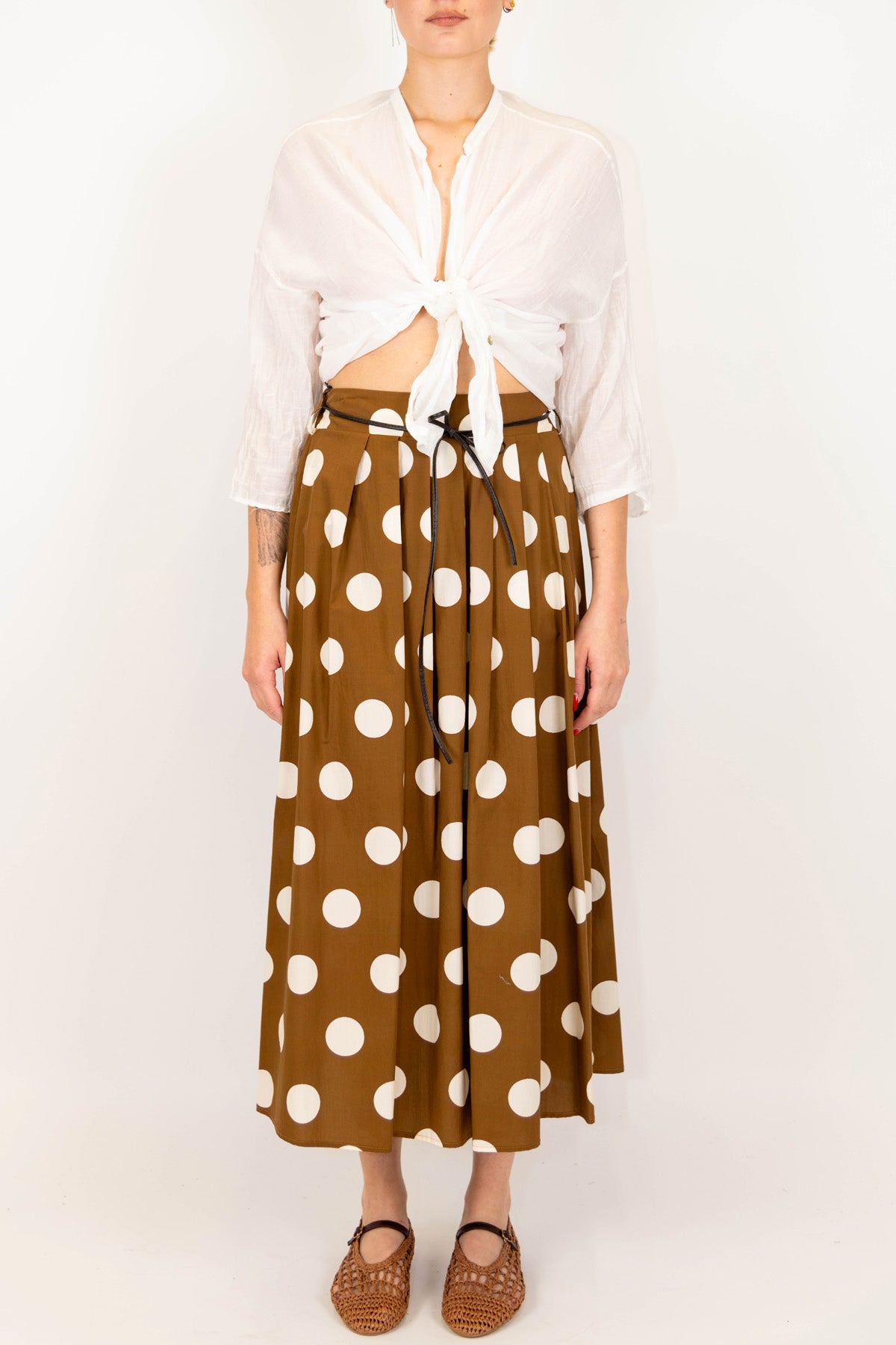 Tensione in - Gonna fantasia pois con pieghe ed elastico sul retro