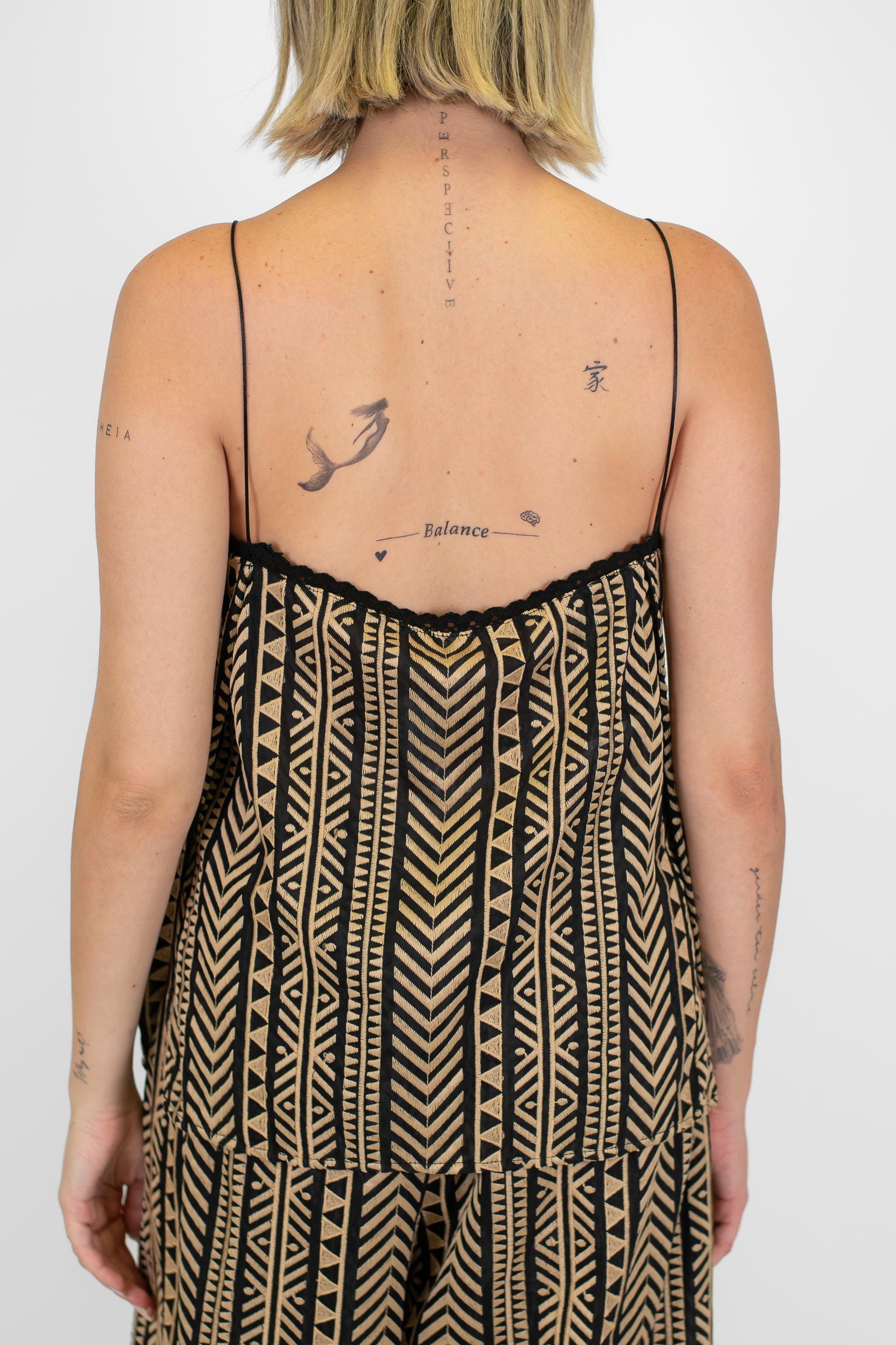 Tensione in - Top fantasia zig zag in mussola di cotone e seta con brfetelline