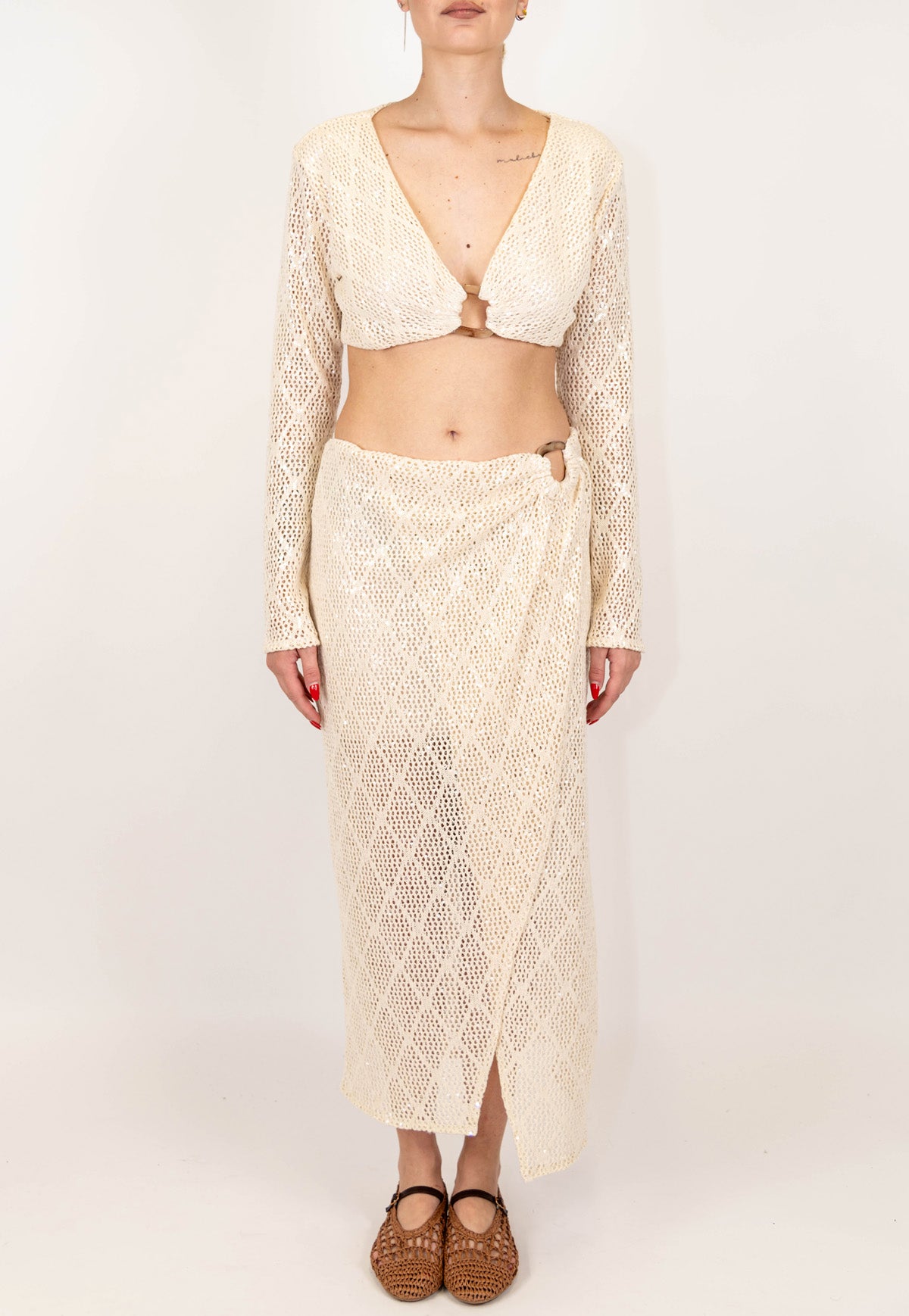 Haveone - Gonna a portafoglio in crochet con anello e paillettes