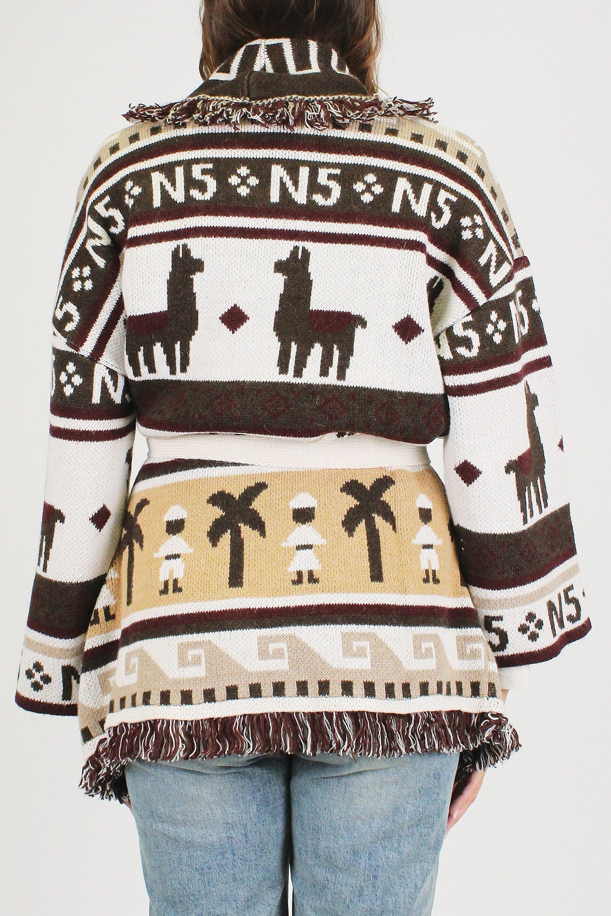 Tensione in - Cardigan fantasia cammelli in misto lana con profilo frange e cintura in tessuto