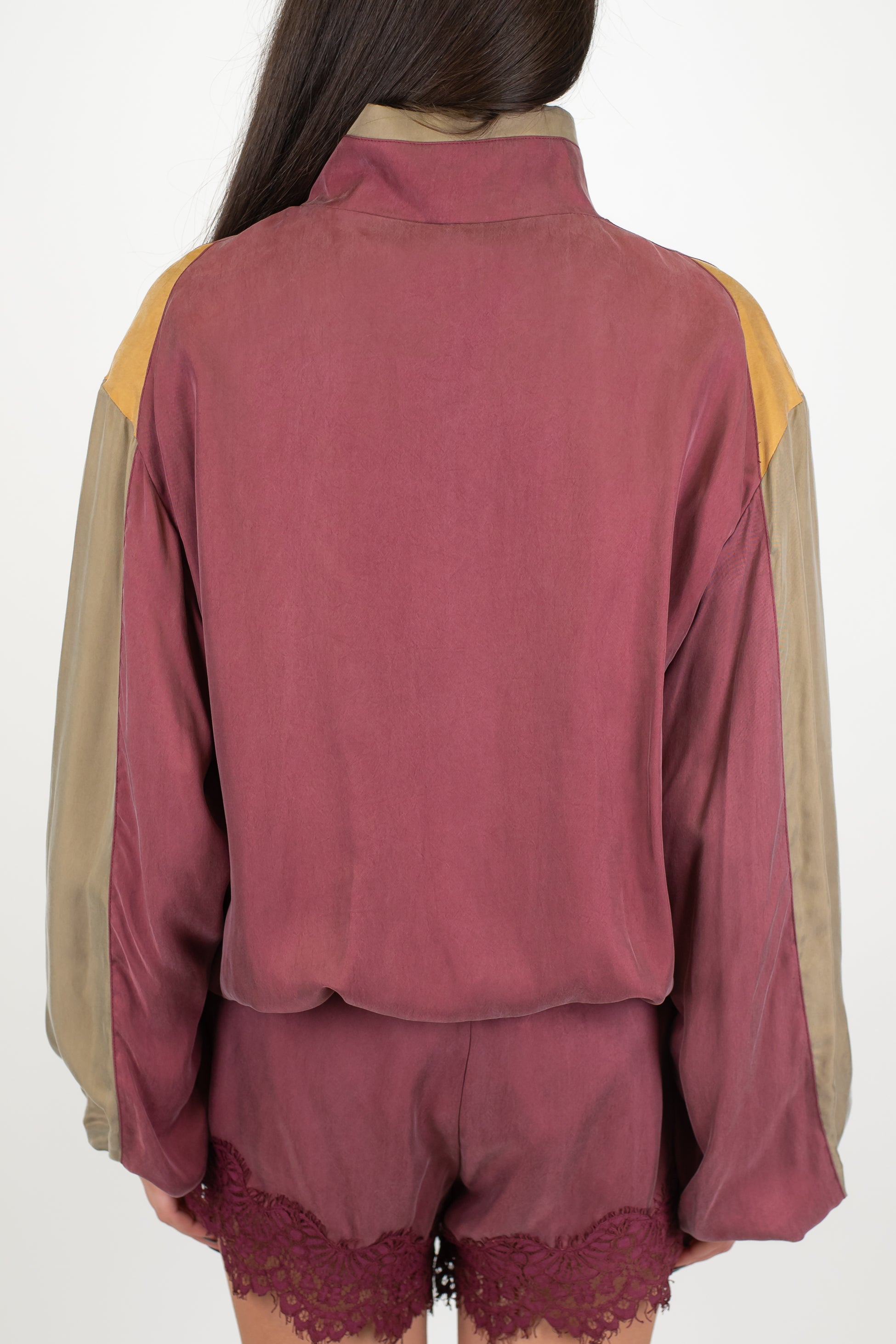 Tensione in - Bomber in cupro con maniche a contrasto ed elastico sul fondo