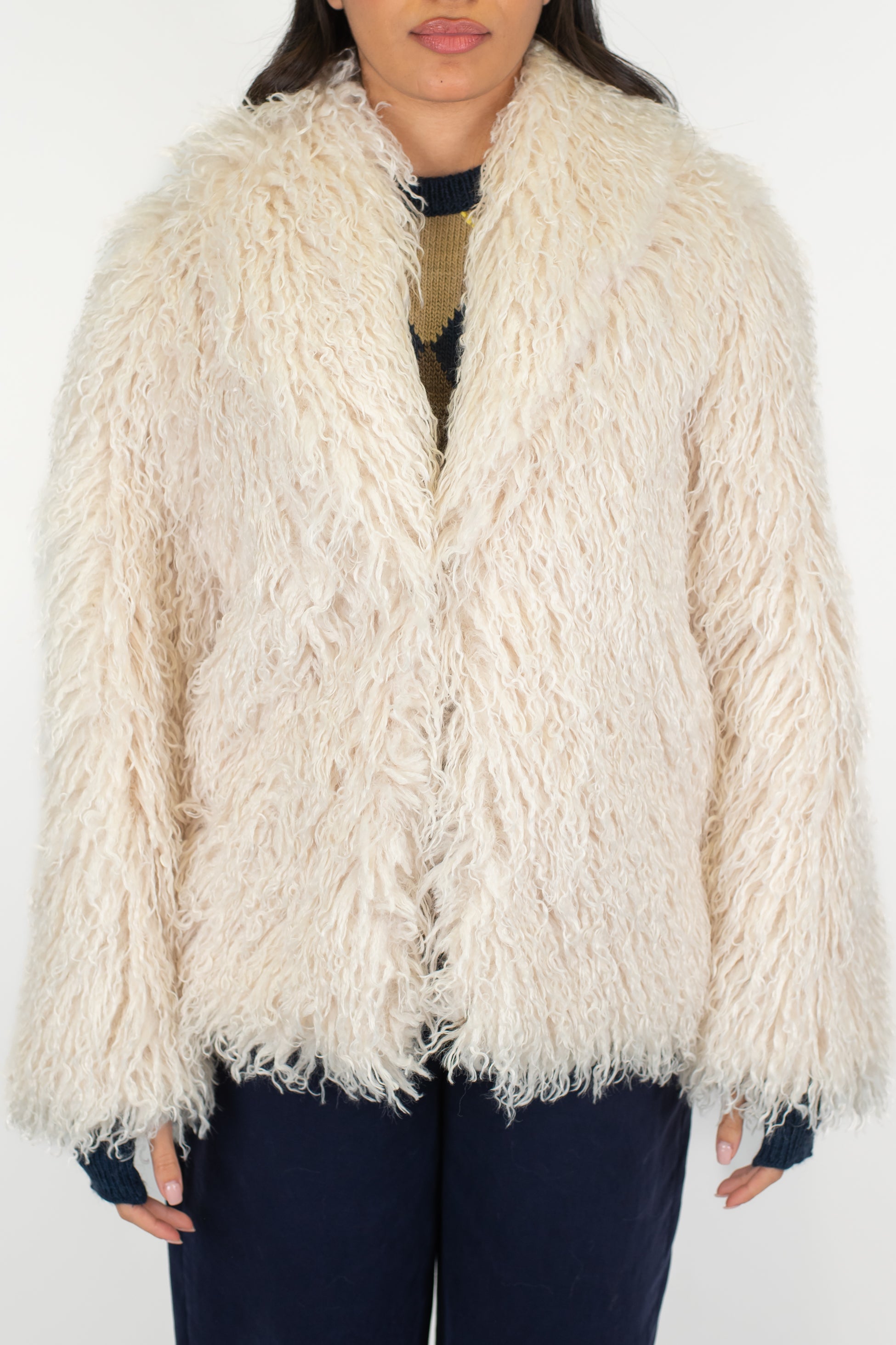 Tensione in - Ecopelliccia mongolia con chiusura a gancio