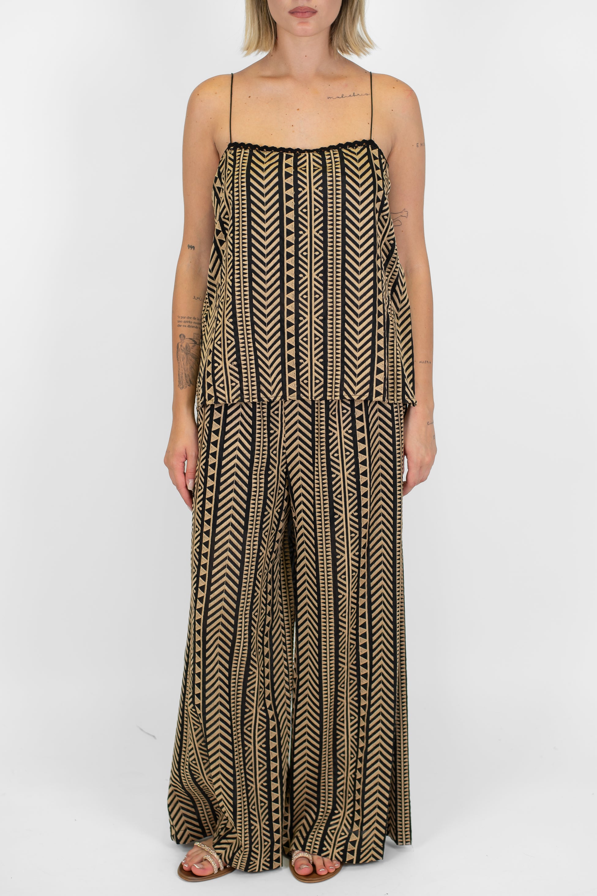 Tensione in - Pantalone palazzo fantasia zig zag in mussola di cotone e seta con elastico in vita