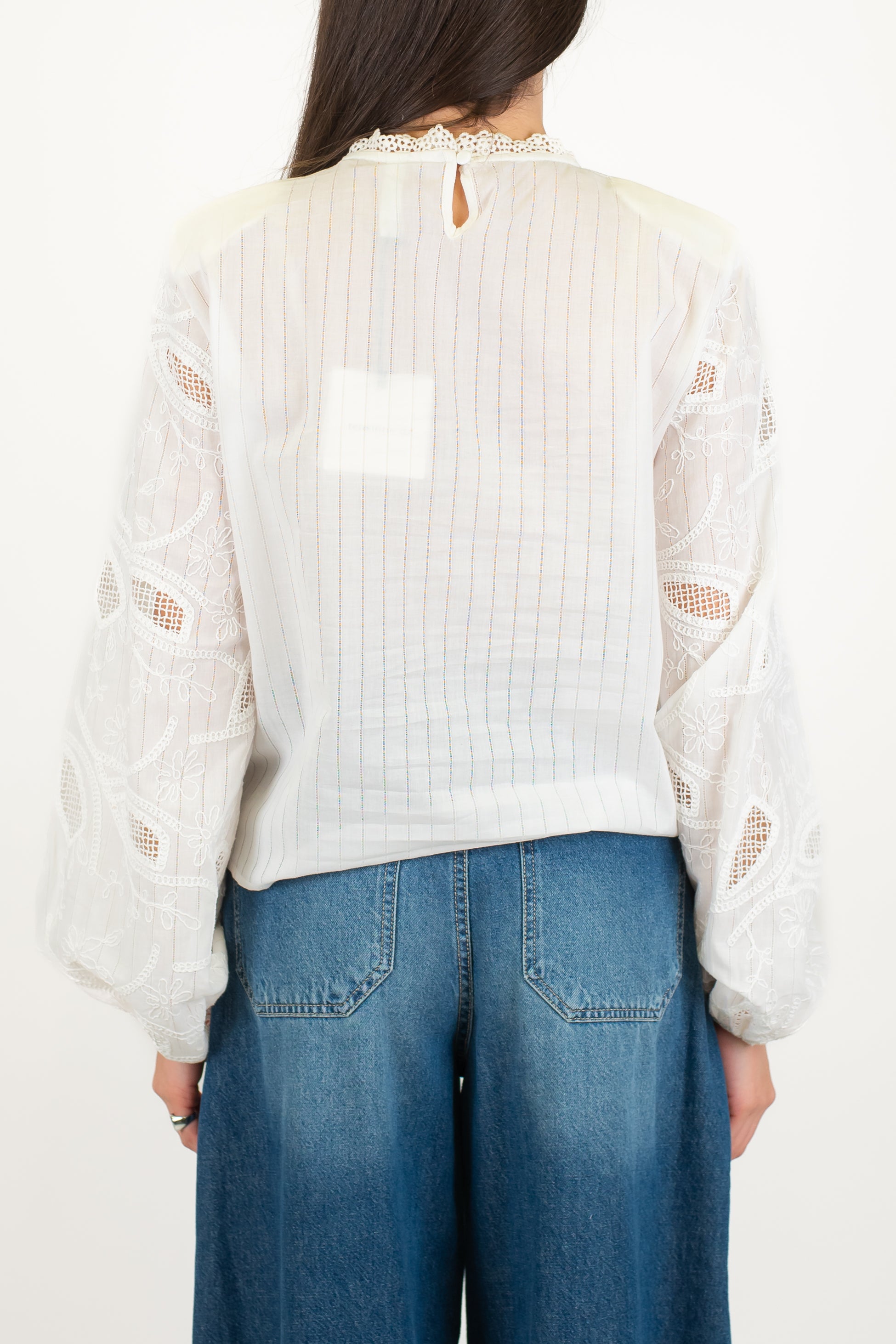 Tensione in - Blusa fantasia floreale con dettagli in pizzo