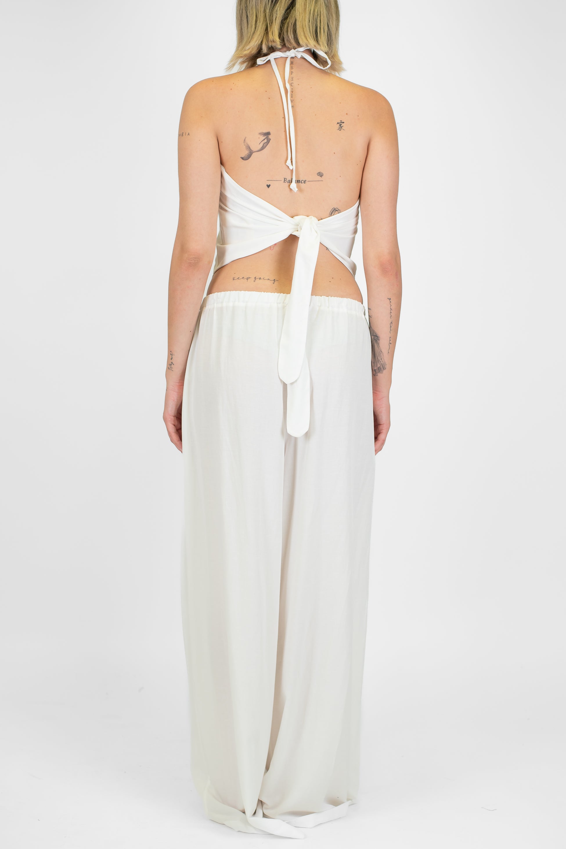 Tensione in - Coordinato in misto lino con allaccio sul retro e pantalone palazzo con elastico in vita