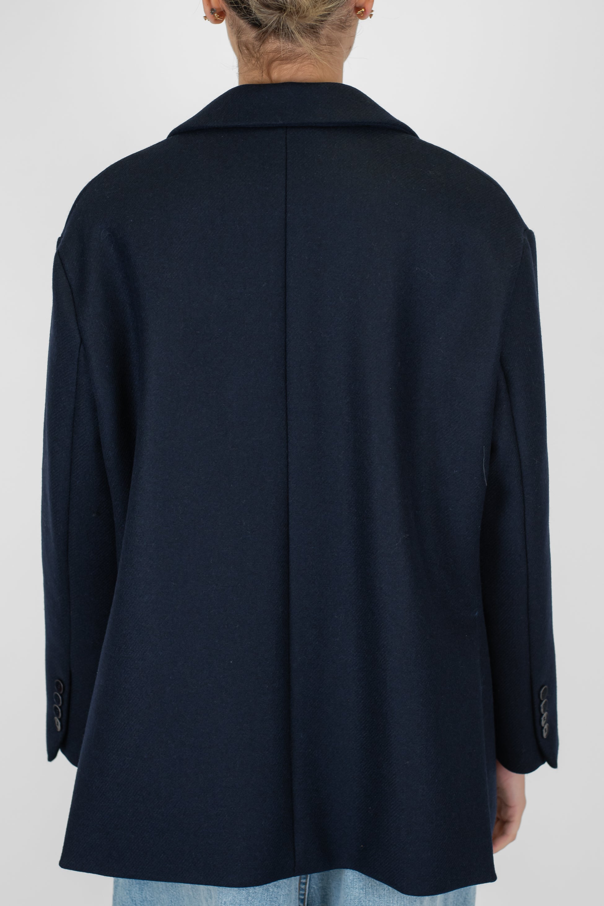 Tensione in - Giacca doppiopetto in misto lana con spilla