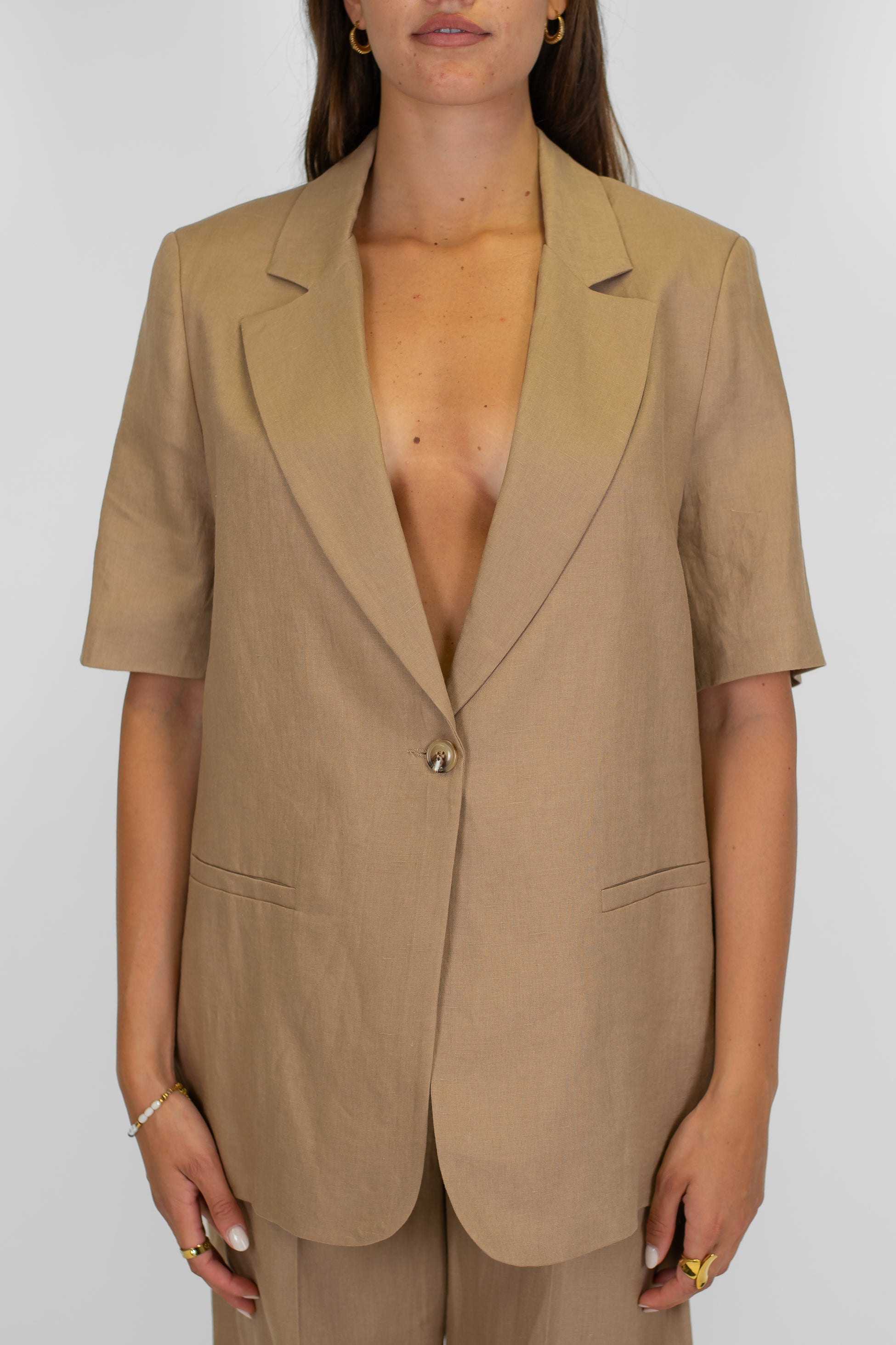 Tensione in - Giacca monopetto mezza manica in 100% lino